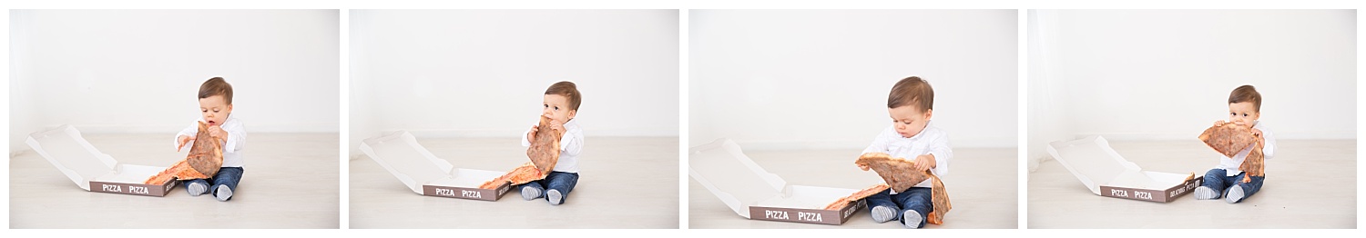 one year old baby boy eating pizza for his first birthday photo shoot on burlington new jersey