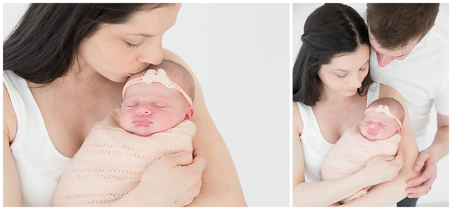mom kissing her newborn baby girl in burlington new jersey photo shoot