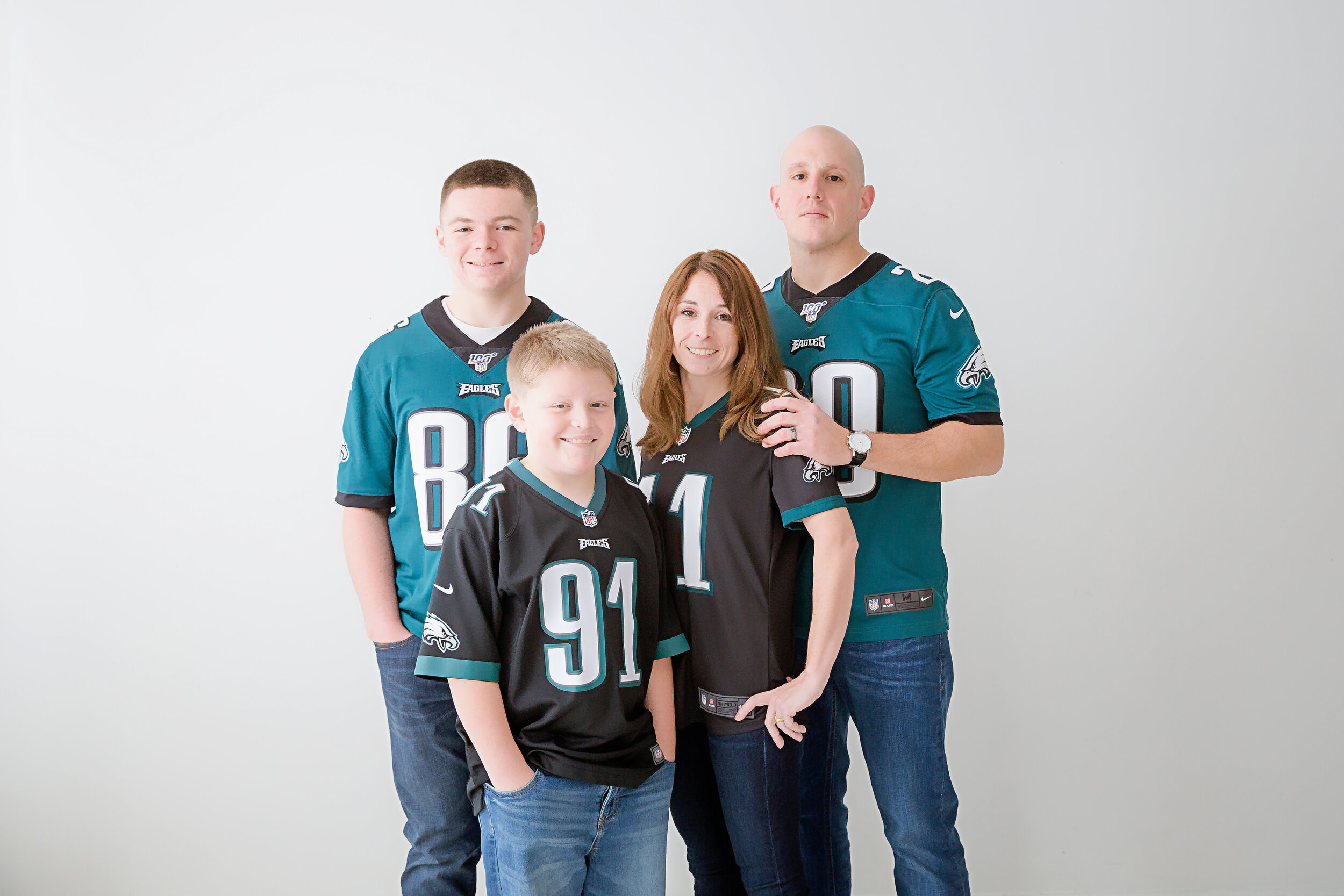 family-of-four-decked-out-in-eagles-gear