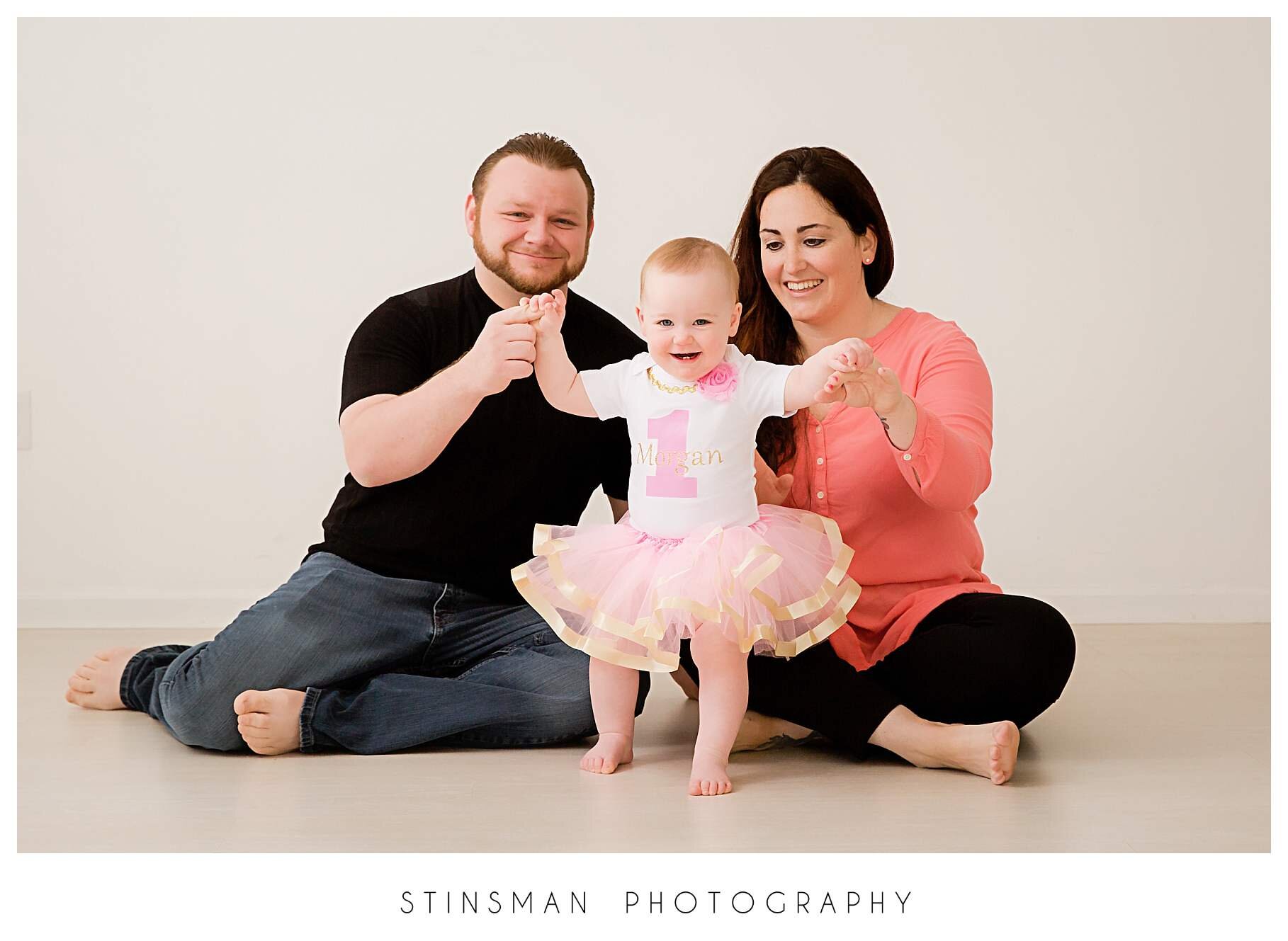 family-photo-with-pink-tut-in-south-jersey-photo-studio.jpeg