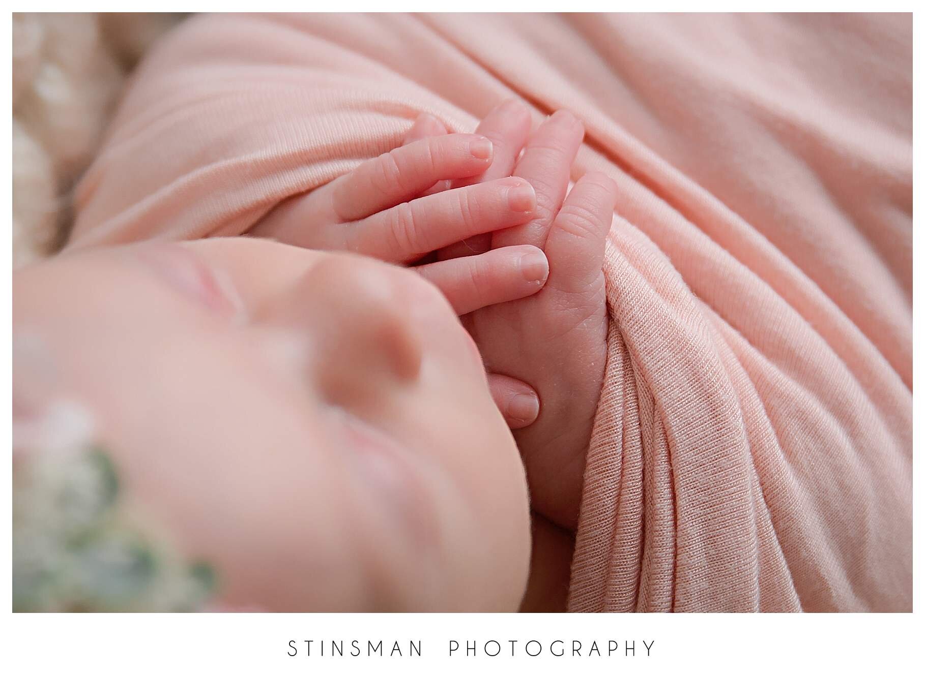 detail photo of newborn girl hands