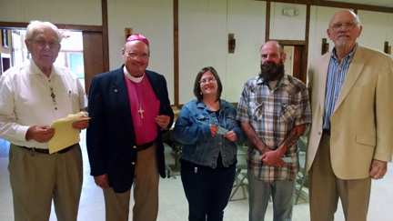 Stan Thornton, our president, and Guenther Pfingsten, membership chairman, welcome three of our new members, f rom right to left, Dwayne Adams his wife Dana Adams and Michael Thannish. Three other new members unable to attend are Ronnie Dorflinger
