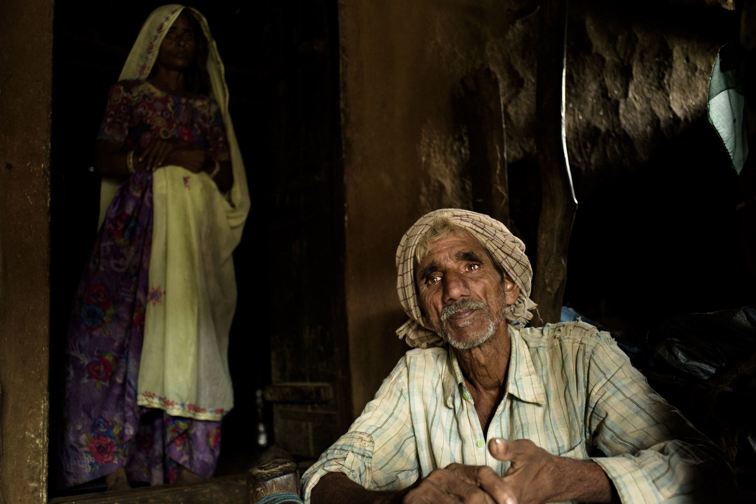  Bhura sits in the courtyard of his house while he explains how the Mukhyamantri Nishulk Dawa Yojna has benefitted him. Bhura lives below the poverty line. With very little income to support a family, he feels relieved that the diagnosis and medicine