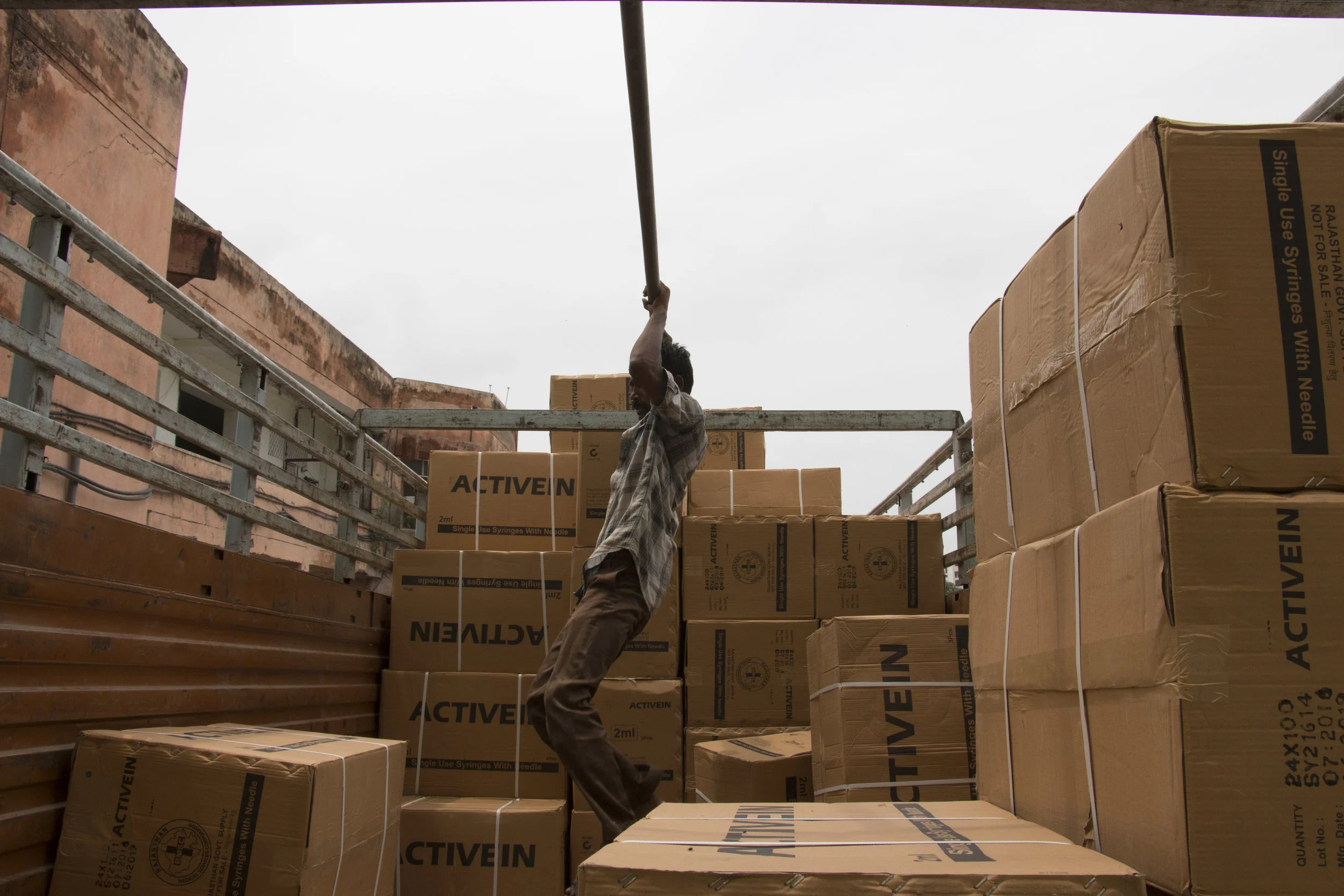 A truck getting loaded with medicine for the distribution to District Drug Centers.