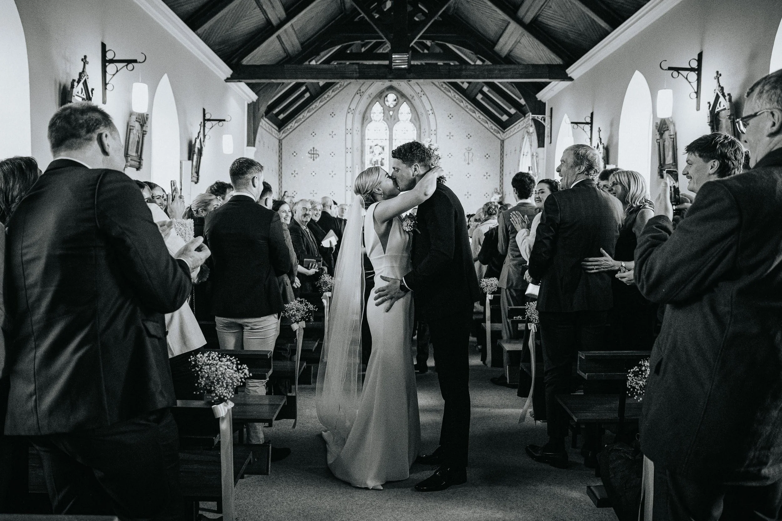 langtons-hotel-kilkenny-wedding-kiltealy-church-bride-and-groom-black-and-white-kiss-and-dip-wedding-ceremony-kate-tobin-liam-ryan-daragh-mccann-stargaze-photography.jpg