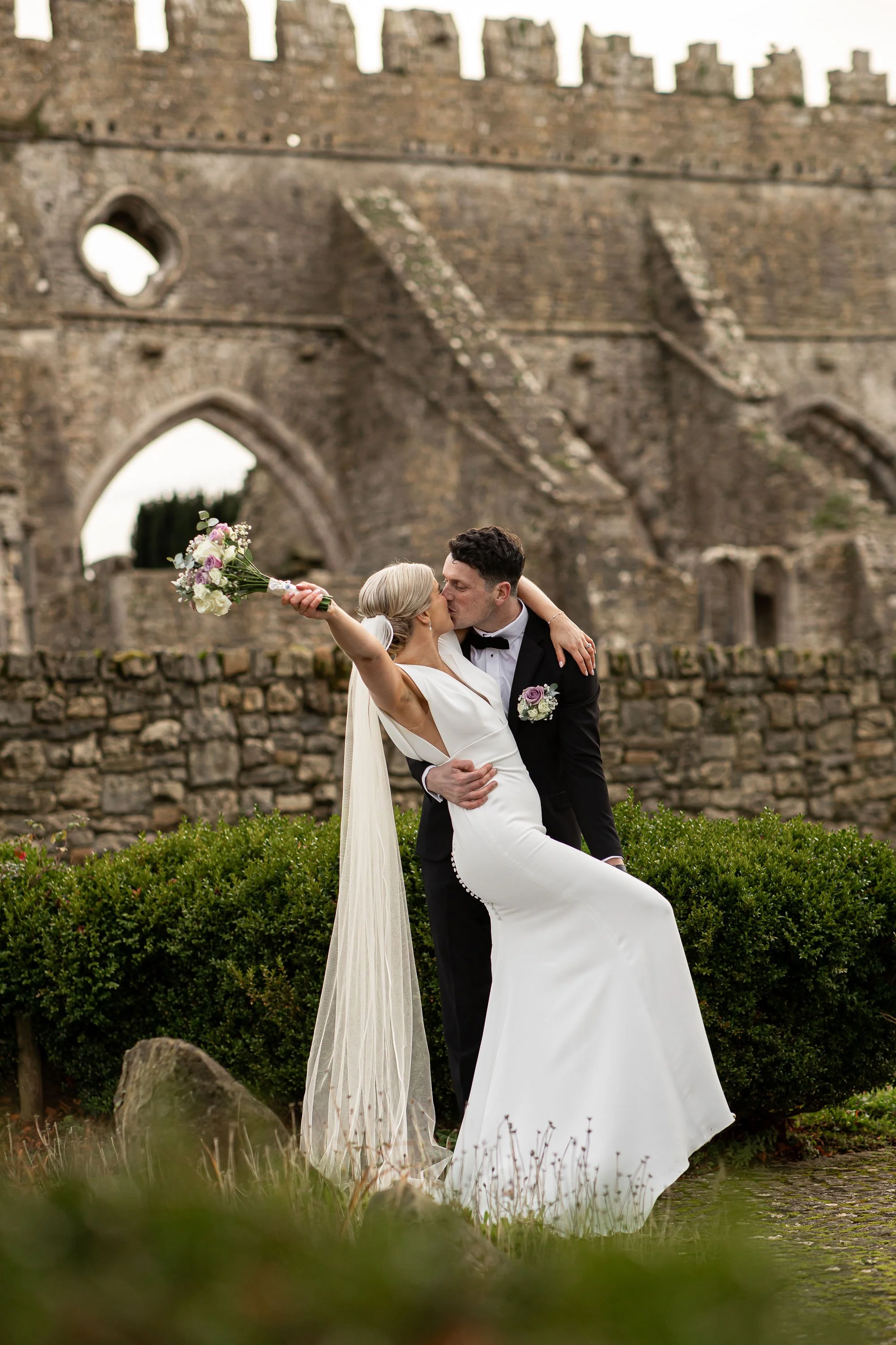 Kate Tobin and Liam Ryan Wexford senior hurler with their wedding party at Gowran Abbey, wearing Folkster bridal gowns; photographed by Daragh McCann, Stargaze Photography, Kilkenny.