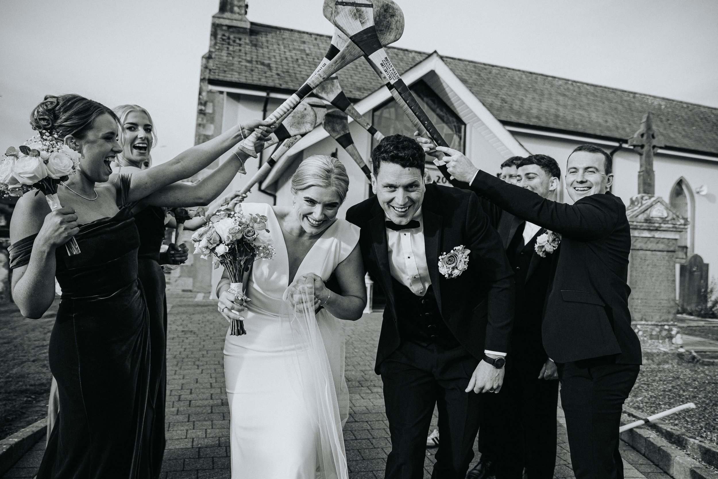 langtons-hotel-kilkenny-wedding-kiltealy-church-bride-and-groom-black-and-white-kiss-hurling-guard-of-honour-wedding-ceremony-kate-tobin-liam-ryan-daragh-mccann-stargaze-photography.jpg.jpg