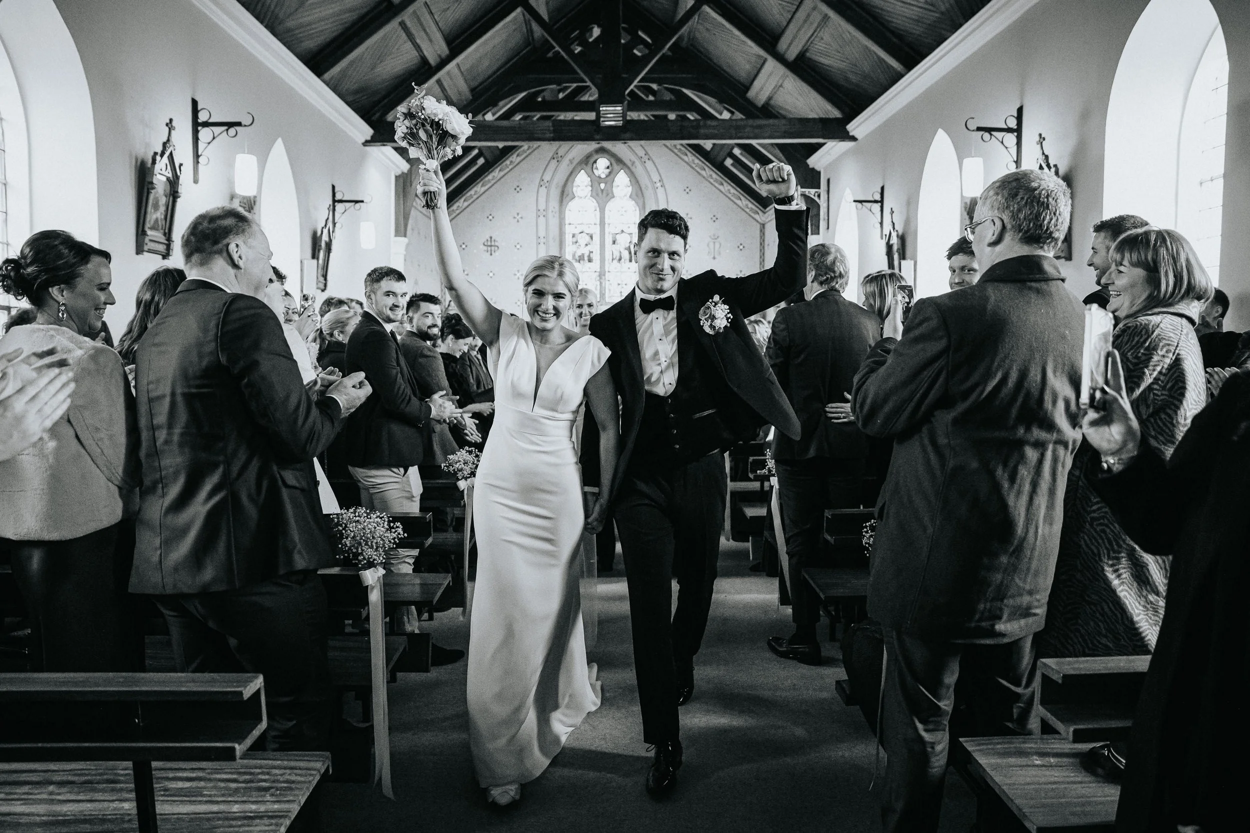 langtons-hotel-kilkenny-wedding-kiltealy-church-bride-and-groom-black-and-white-kiss-wedding-ceremony-kate-tobin-liam-ryan-daragh-mccann-stargaze-photography.jpg