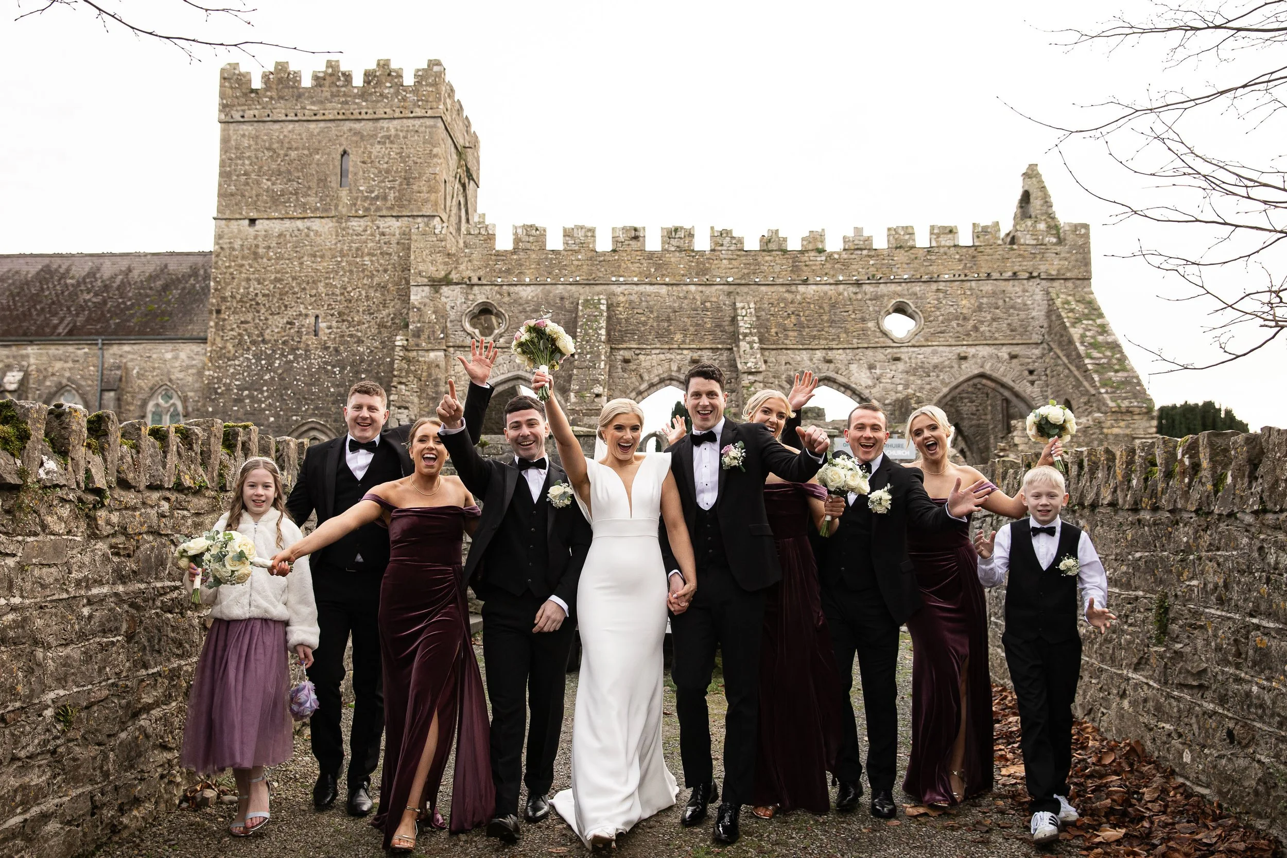 gowran-abbey-bridal-party-having-a-laugh-folkster-gowns-kate-tobin-liam-ryan-wexford-senior-hurler-donal-o'connor-oc-wedding-videography-daragh-mccann-stargaze-photography.jpg