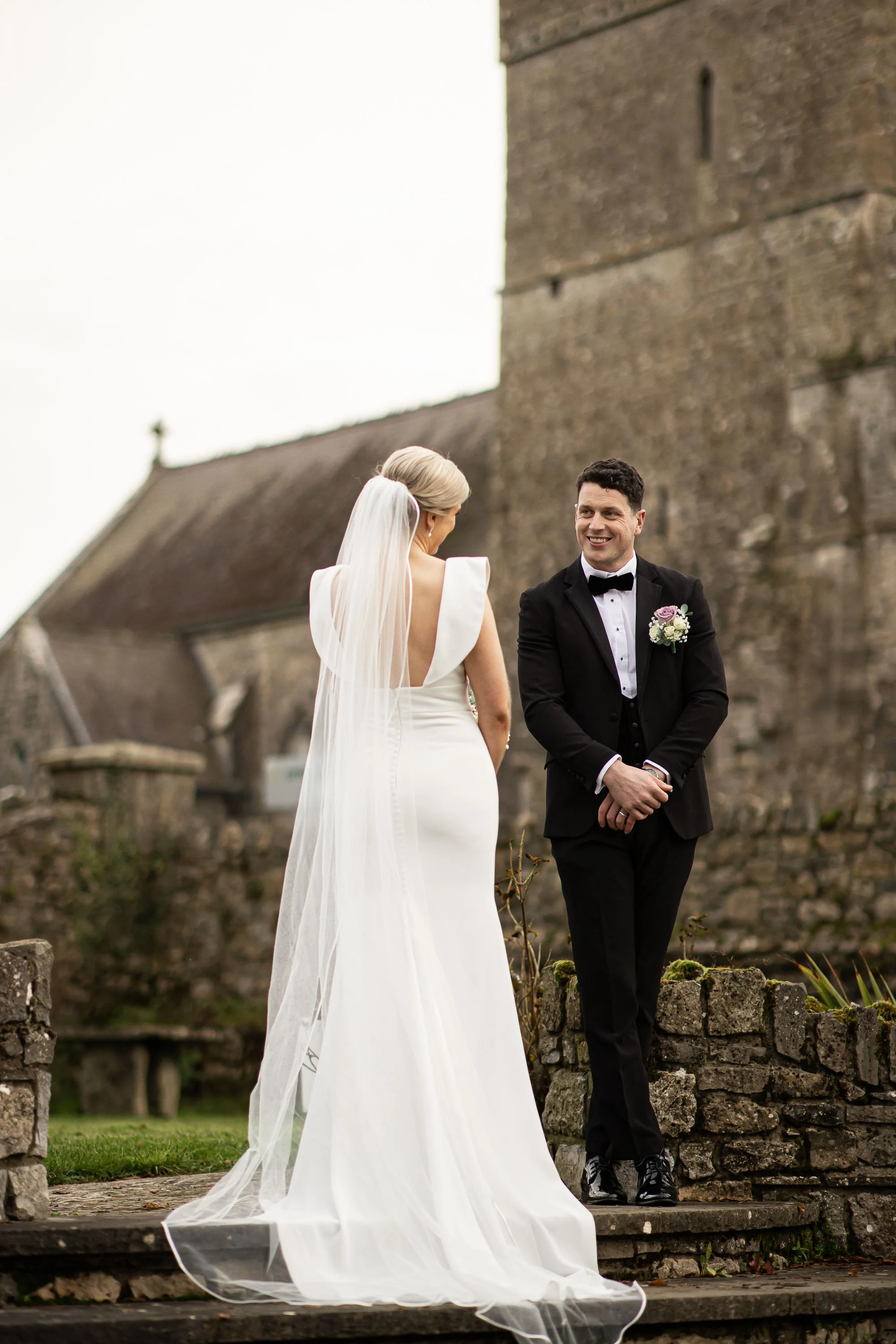 langtons-hotel-wedding-gowran-abbey-bride-and-groom-share-a-smile-folkster-gowns-kate-tobin-liam-ryan-wexford-senior-hurler-donal-o'connor-oc-wedding-videography-daragh-mccann-stargaze-photography.jpg