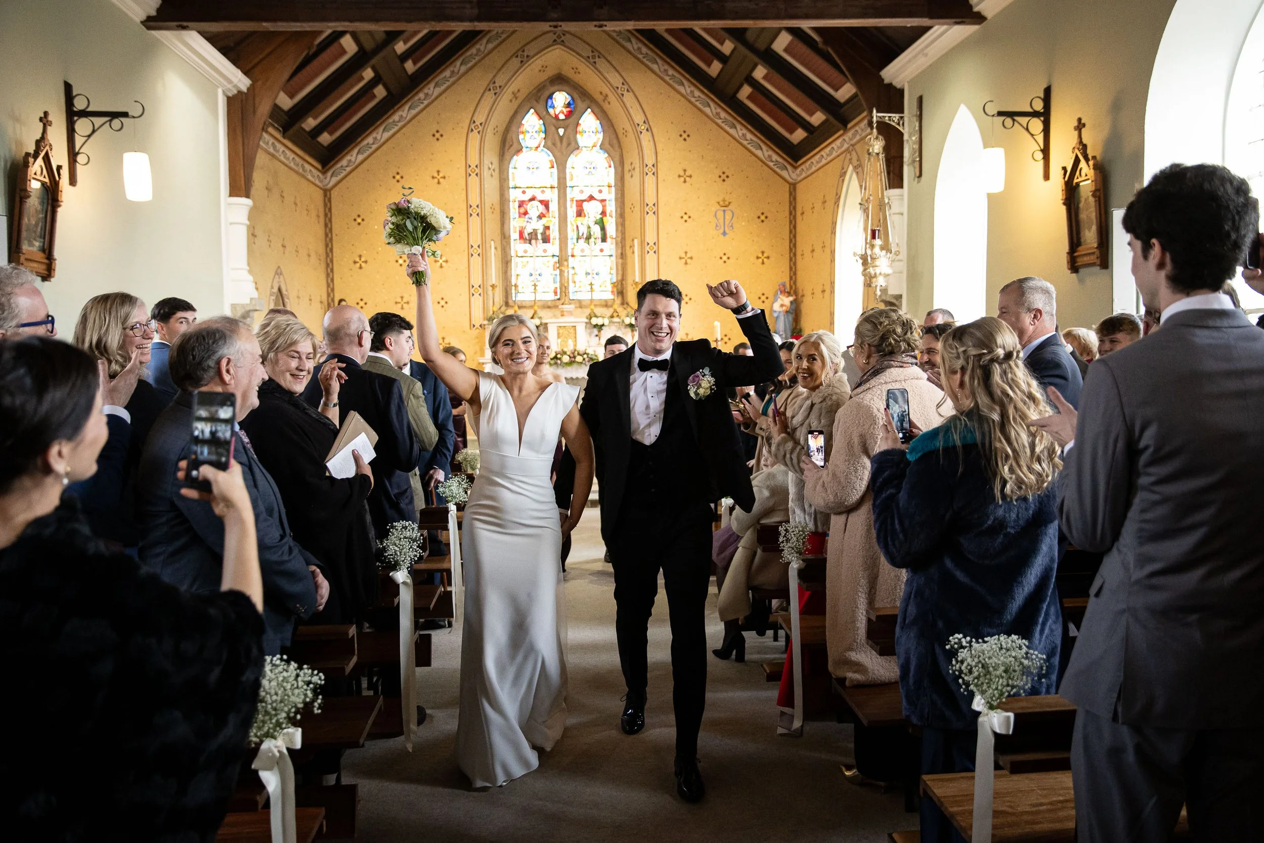 langtons-hotel-kilkenny-wedding-kiltealy-church-bride-and-groom-exit-wedding-ceremony-kate-tobin-liam-ryan-daragh-mccann-stargaze-photography.jpg