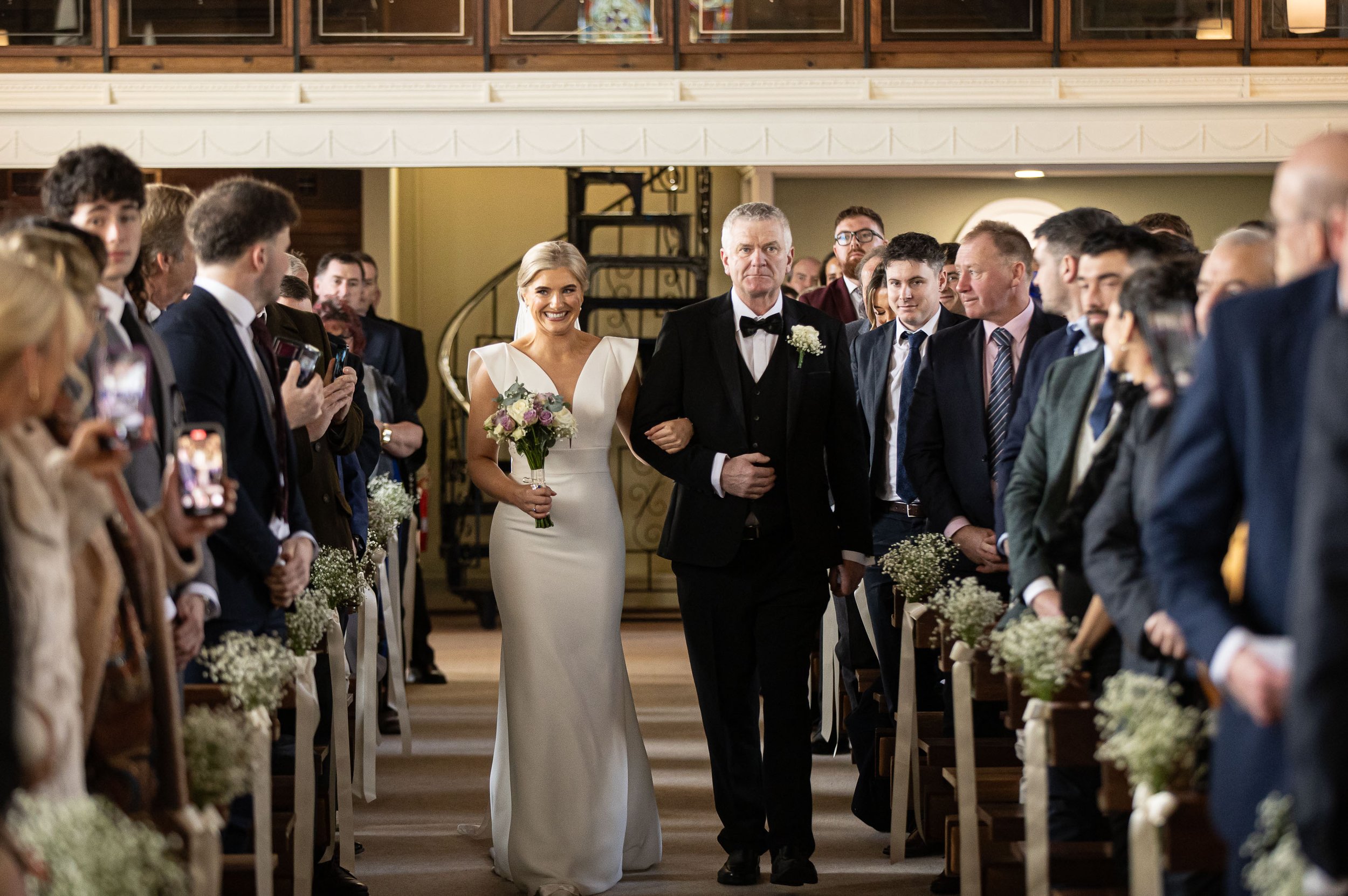 langtons-hotel-kilkenny-wedding-kiltealy-church-bride-arrives-with-father-to-walk-down-the-aisle-wedding-ceremony-kate-tobin-liam-ryan-daragh-mccann-stargaze-photography.jpg