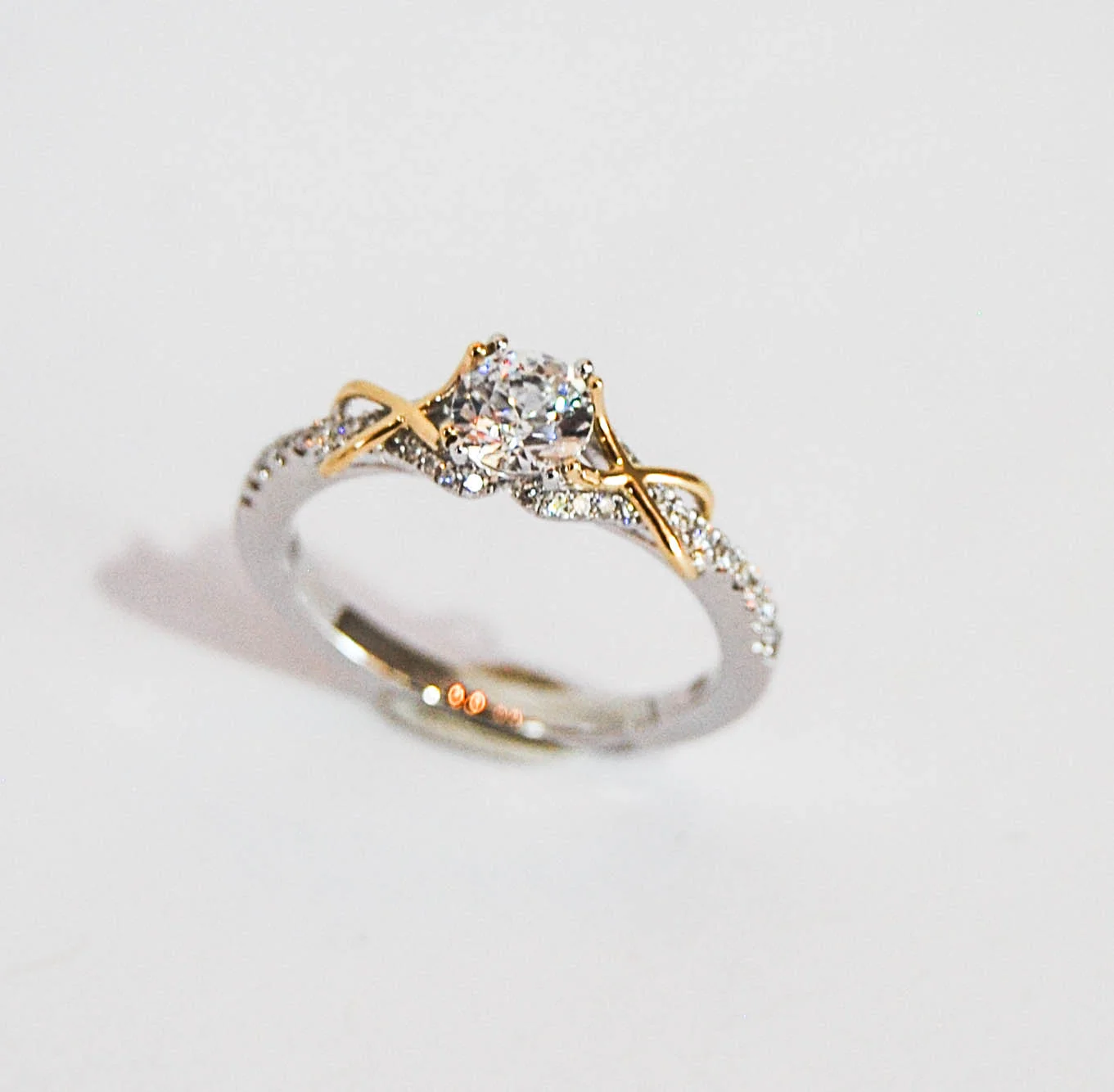 140-389 14 Karat White and Yellow Gold Twist Wire Semi Mount Engagement Ring with 38=0.21Tw Round Diamonds. Shown with a .50 Carat Cubic Zirconium. $2,579.00