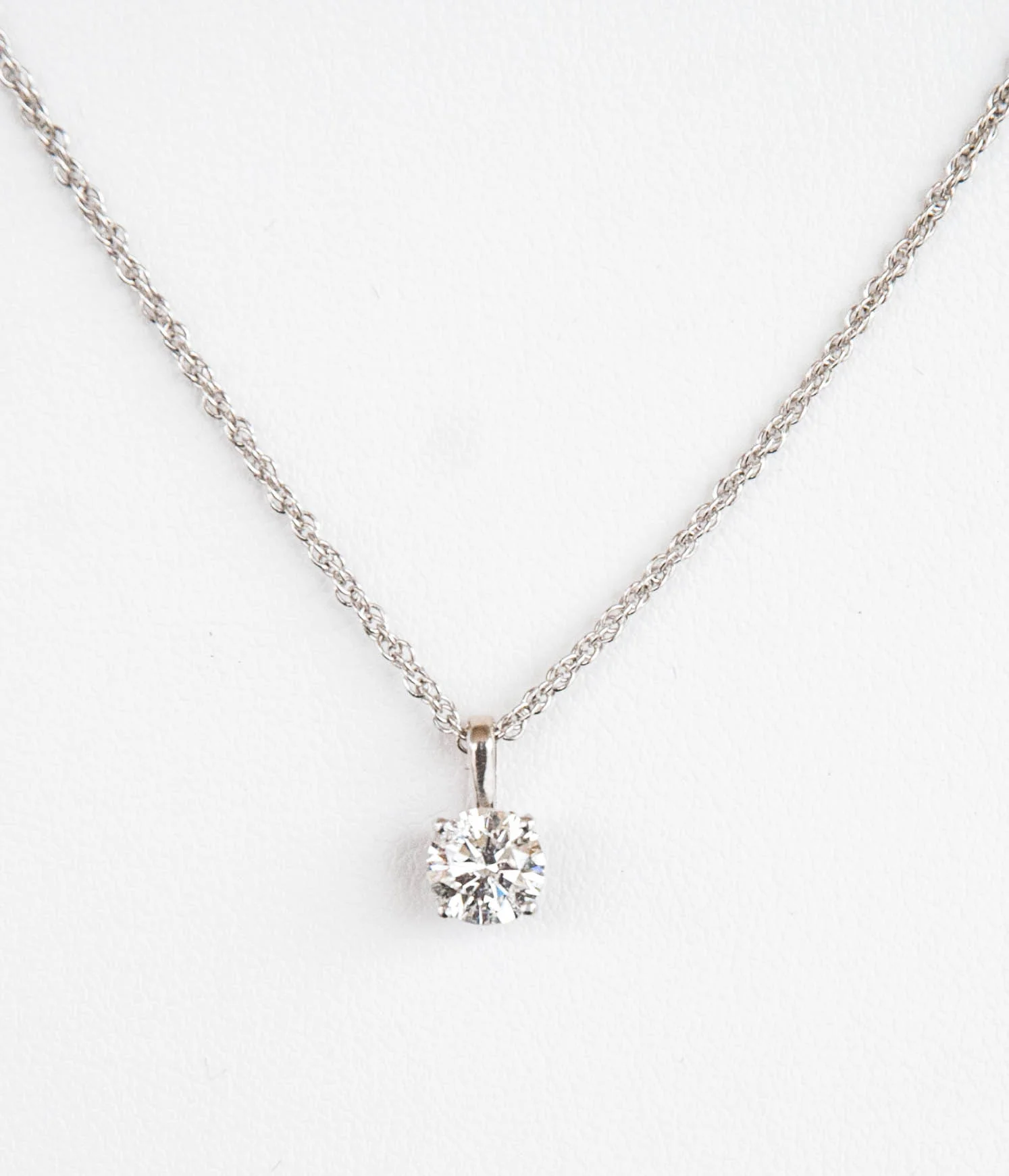 160-356 14 Karat White Gold Pendant with One 0.75 Carat Round Diamond, Clarity I3, Color G 18" Sterling Silver Rope Chain $3,749.00