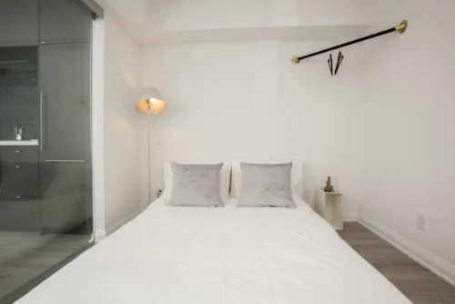 Yorkville Furnished Suite bed, pillows.jpg