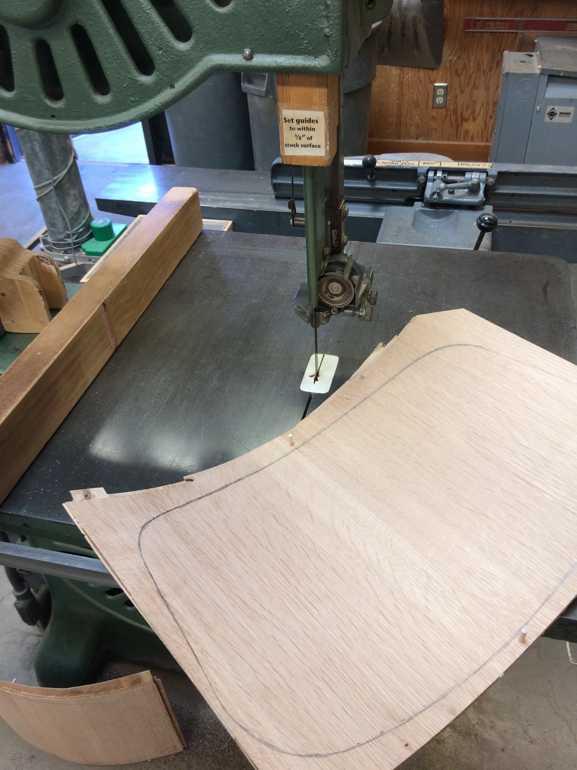 The bandsaw makes quick work of the waste. A compass planes, block plane, and spokeshaves will remove the tool marks and fair the curves.