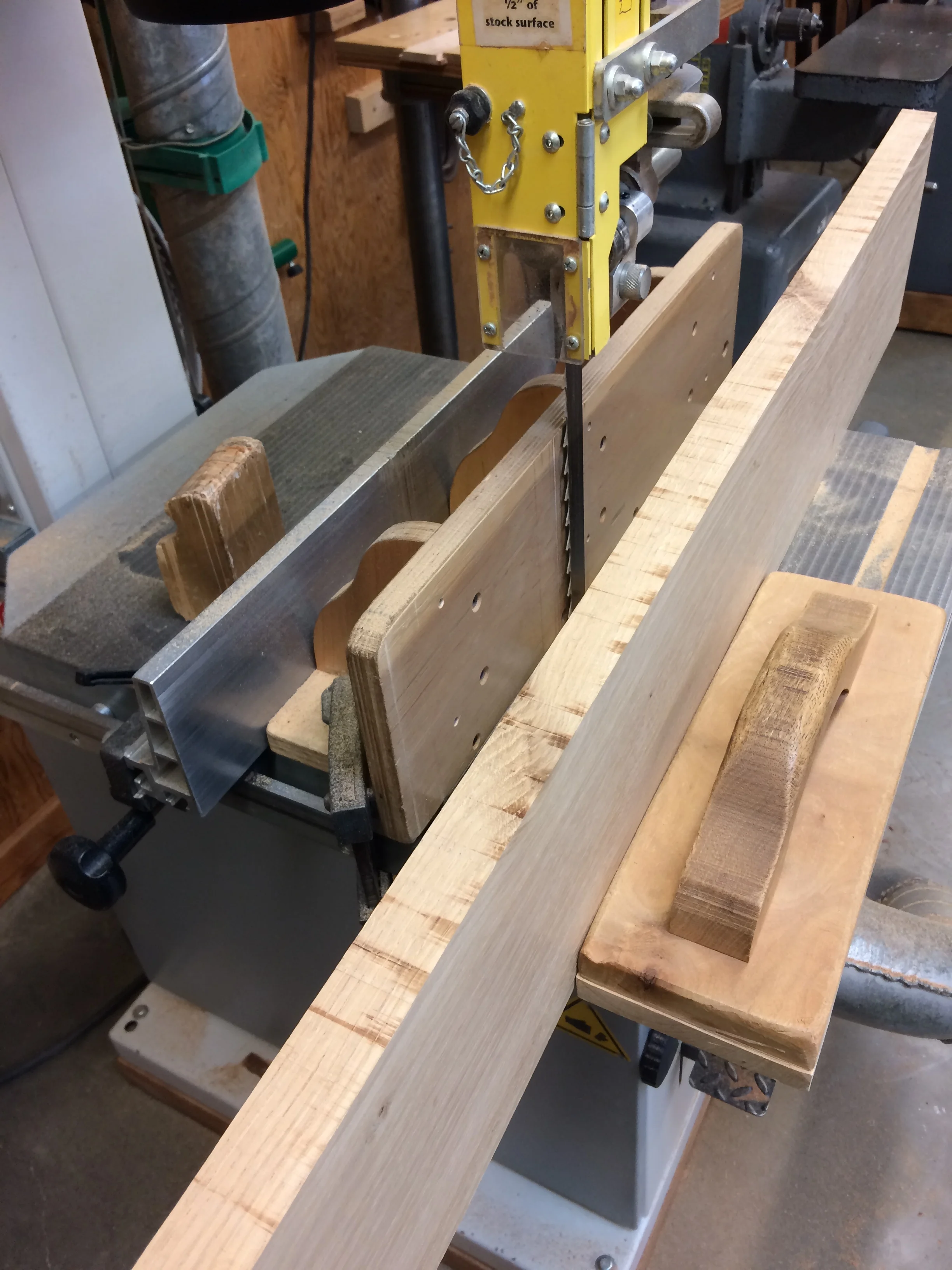 Re-saw the plank to make veneers.