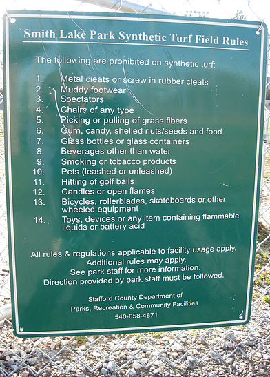 This is where the 'warning signs' get transparent. This sign goes to great lengths to protect the field. (No chairs? No food? No spectators?)