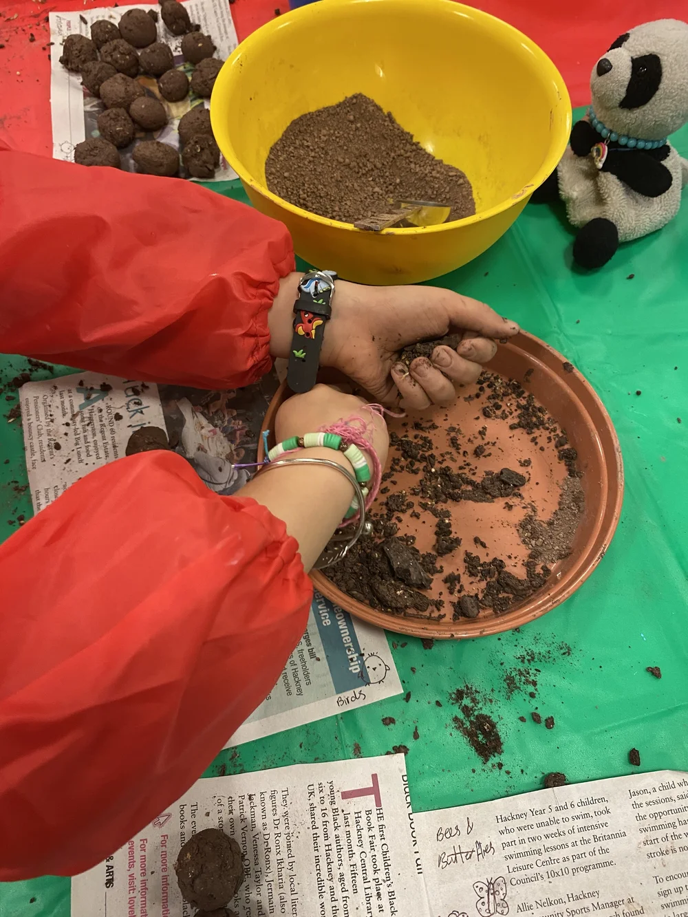 Seedball making kids hands.JPG