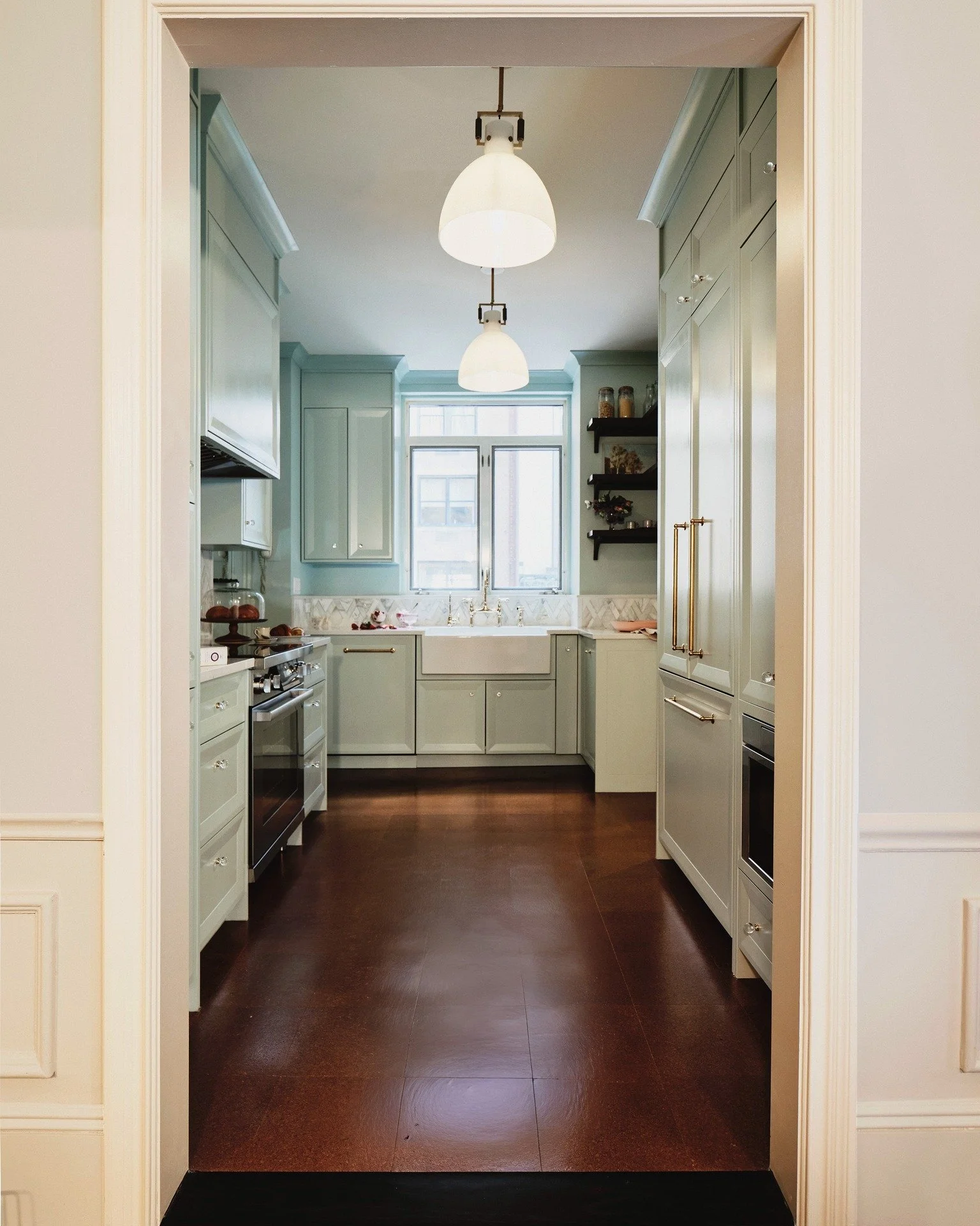 Our clients approached us after purchasing what many would call an "estate condition" apartment in a beautiful Upper East Side building.

We took an alternative approach. Elements of the original 1960s renovation still had real charm and fi