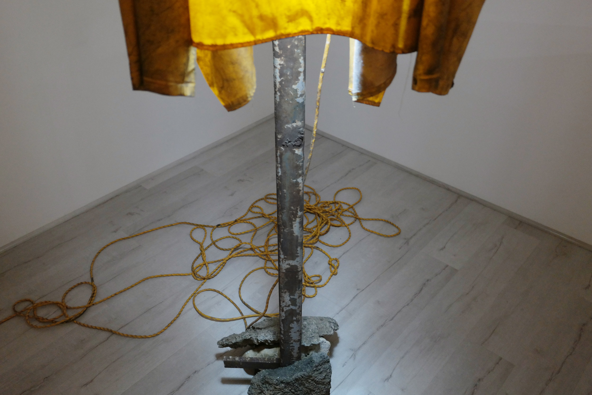 Sun Valley Shroud Iron, raincoat, led lamp, stones, cement, cord, string, 2017