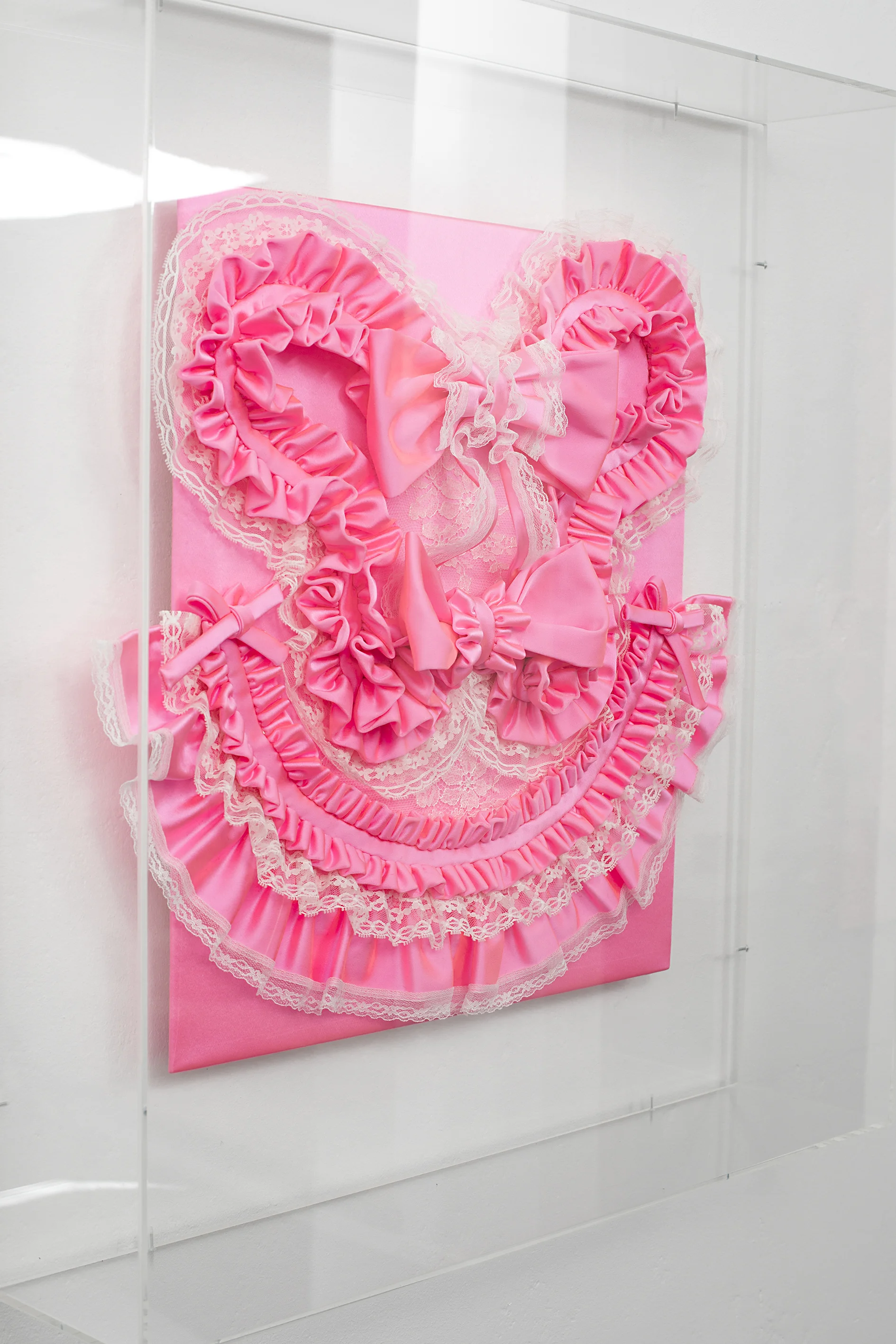 Side detail of Gabriella Loeb, trigger happy , silk satin, lace, plexiglass 61 x 66 x 14 cm