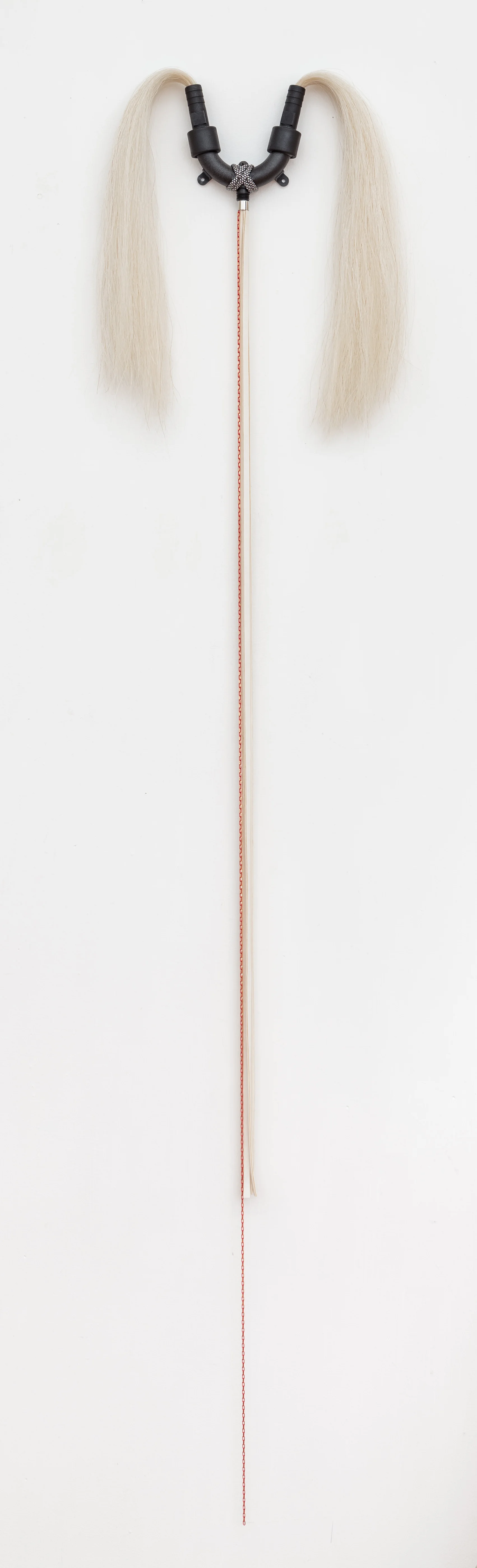 Trish Tillman, Tease , 2015 Plastic fitting, horse hair, aluminum, chain, vinyl 57” x 12” x 3"