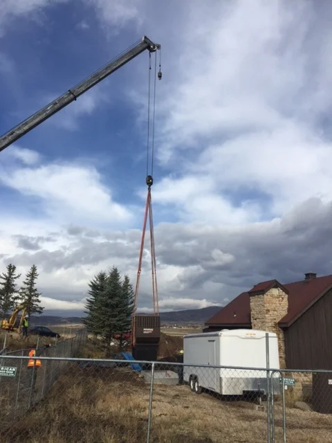 Installation of 350 kw back-up power generator at well site.