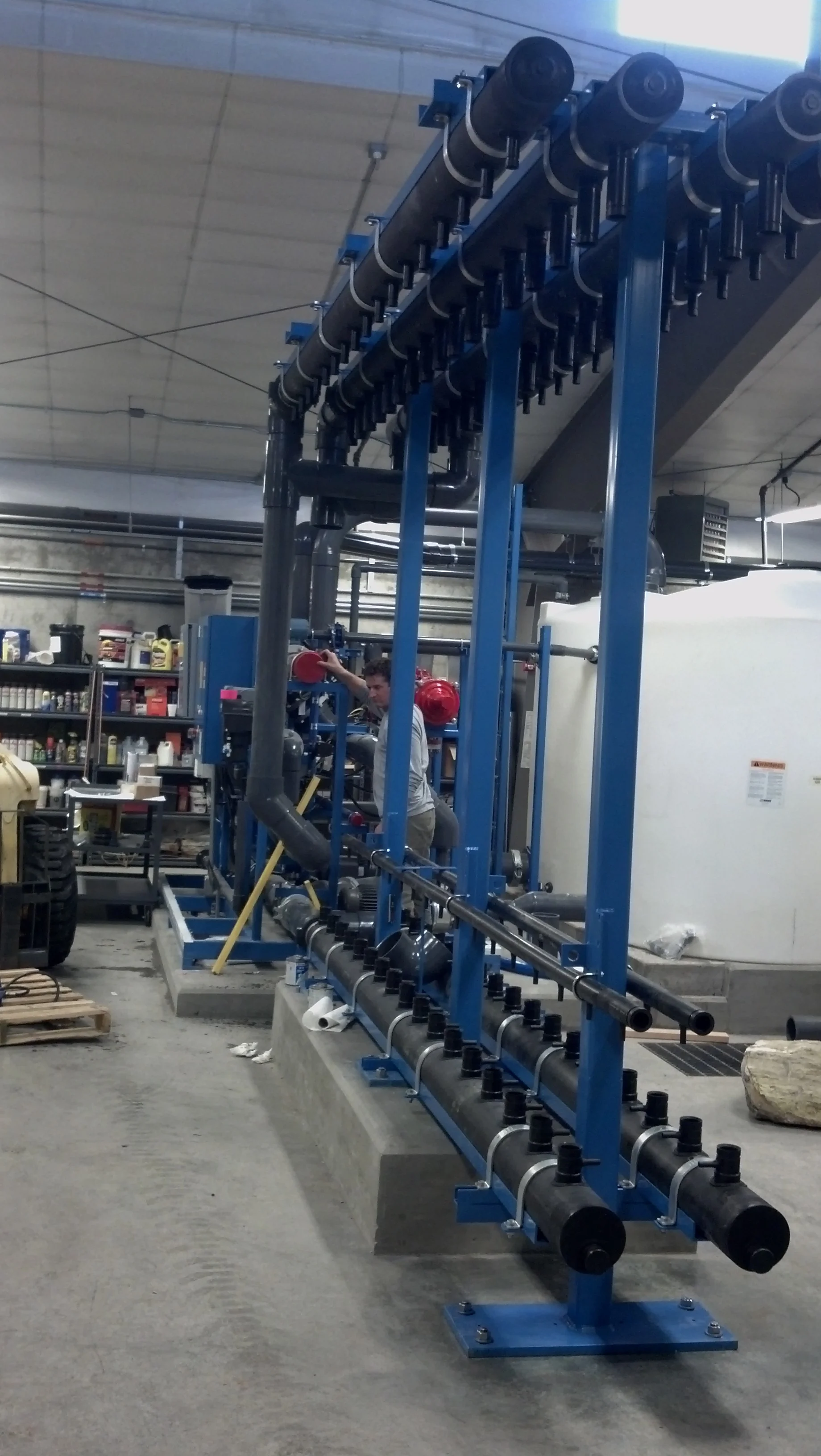 Assembly of the piping, valving, and control system of the new skid.