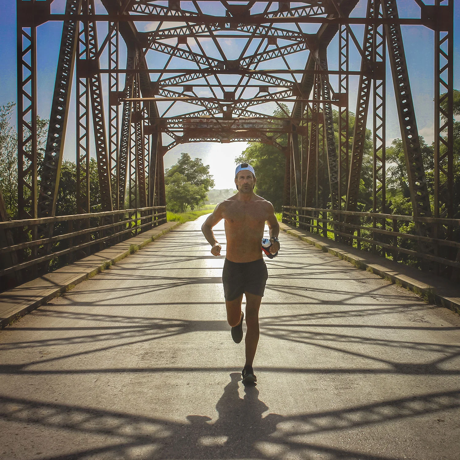 Crossing an American steel, pre-Revolutionary Bridge in the Cuban countryside.