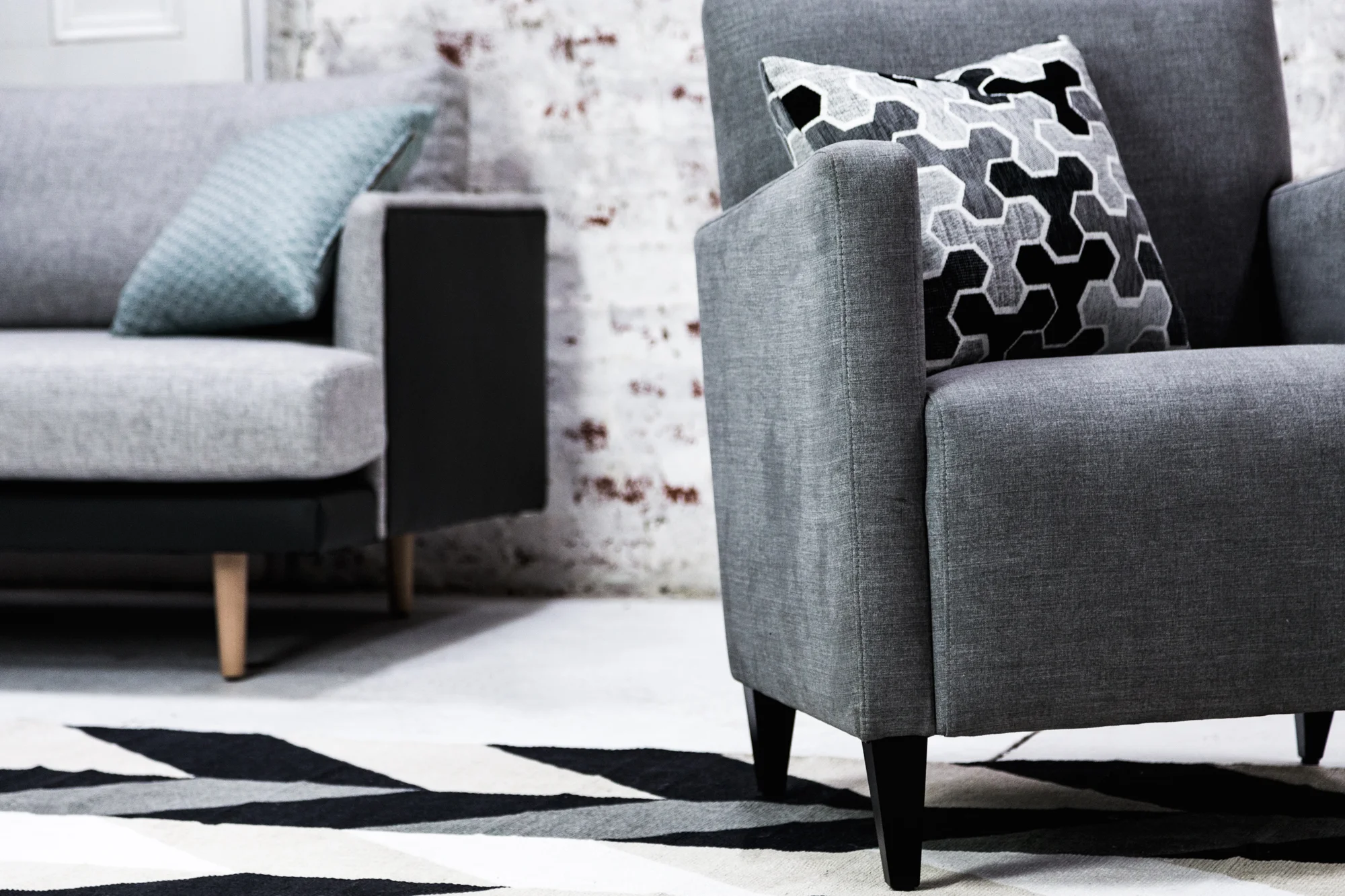 Sofa: Obsession Warm Haze. Scatter: Carlisia Black.