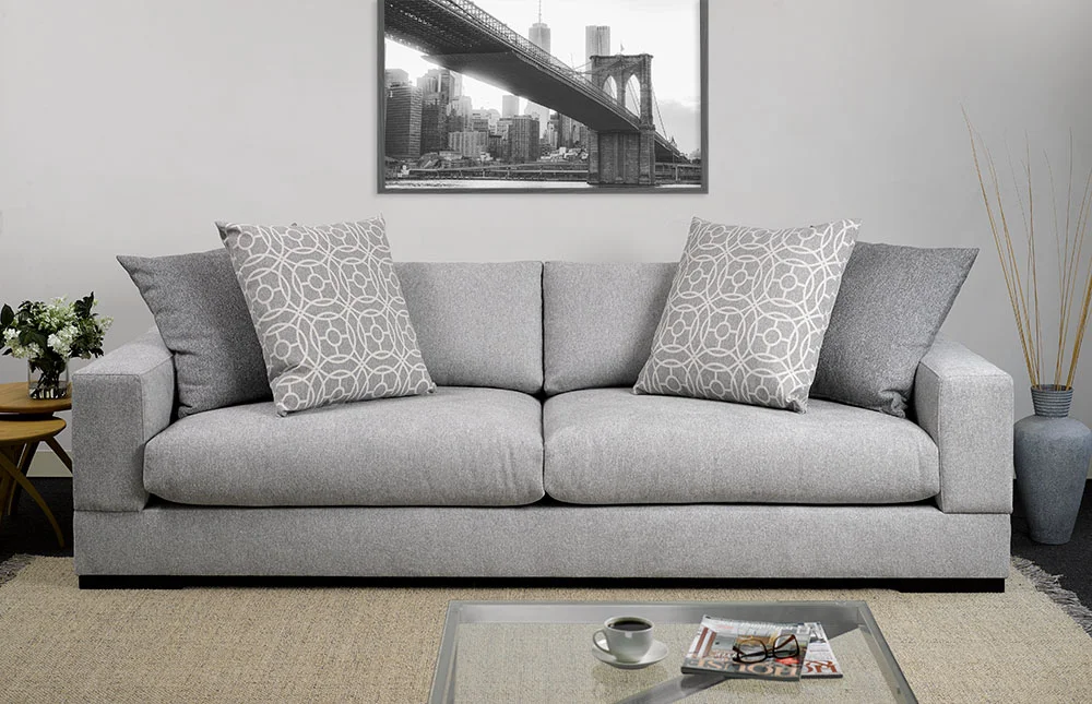 Sofa: Frontier Silver. Scatters: Frontier Pewter, Hooper Pewter.