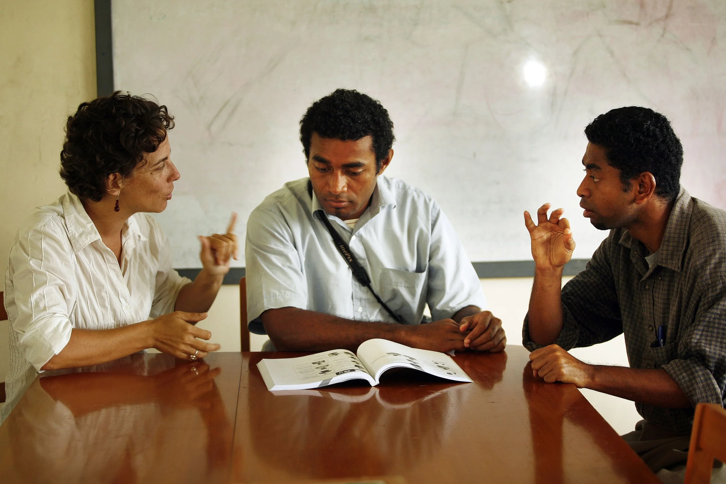 Kate_Nelson_Australian_volunteer_with_research_assistants_Apenisa_Matairavula_centre_and_Saminsoni_Weleilakeba_from_the_Fiji_Association_for_the_Deaf_Fiji_2008._Photo-_Rob_Maccoll_10706279134.jpg