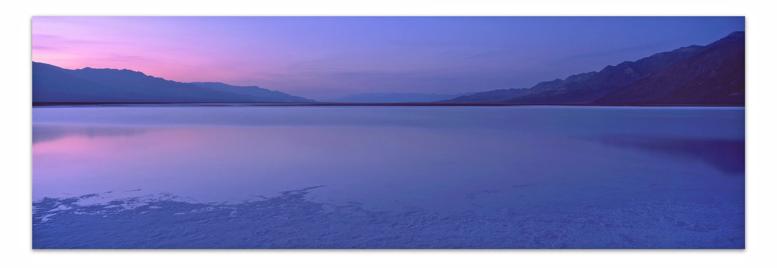 Fade to Blue | California | Edition of 11 A moment of reflection near Badwater Basin. Spring rains in Death Valley National Park flooded the park at its lowest point offering an extremely rare glimpse at the hottest and driest location on earth with standing water for nearly 2 weeks during the month of March. 20x60, 24x72, 30x90, 40x120, 50x150 (Panels Only)