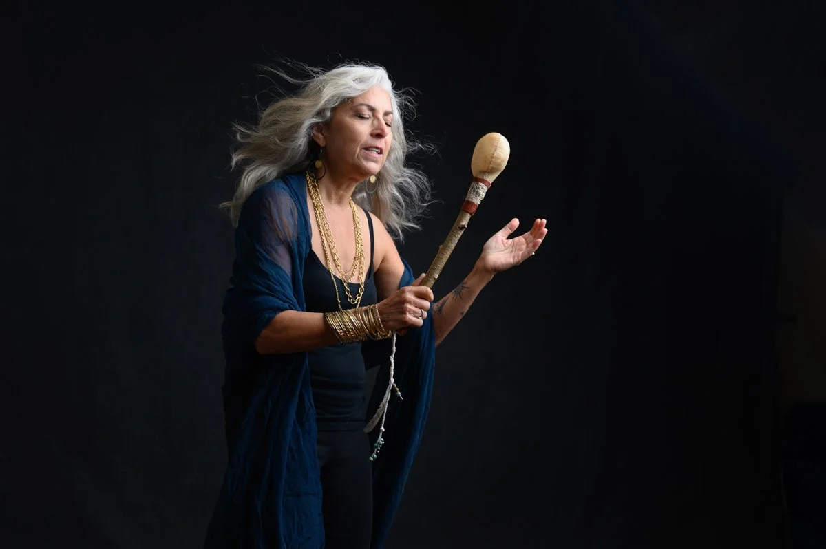 beautiful woman in her 60s.  long flowing gray hair.  Goddess Session Portrait