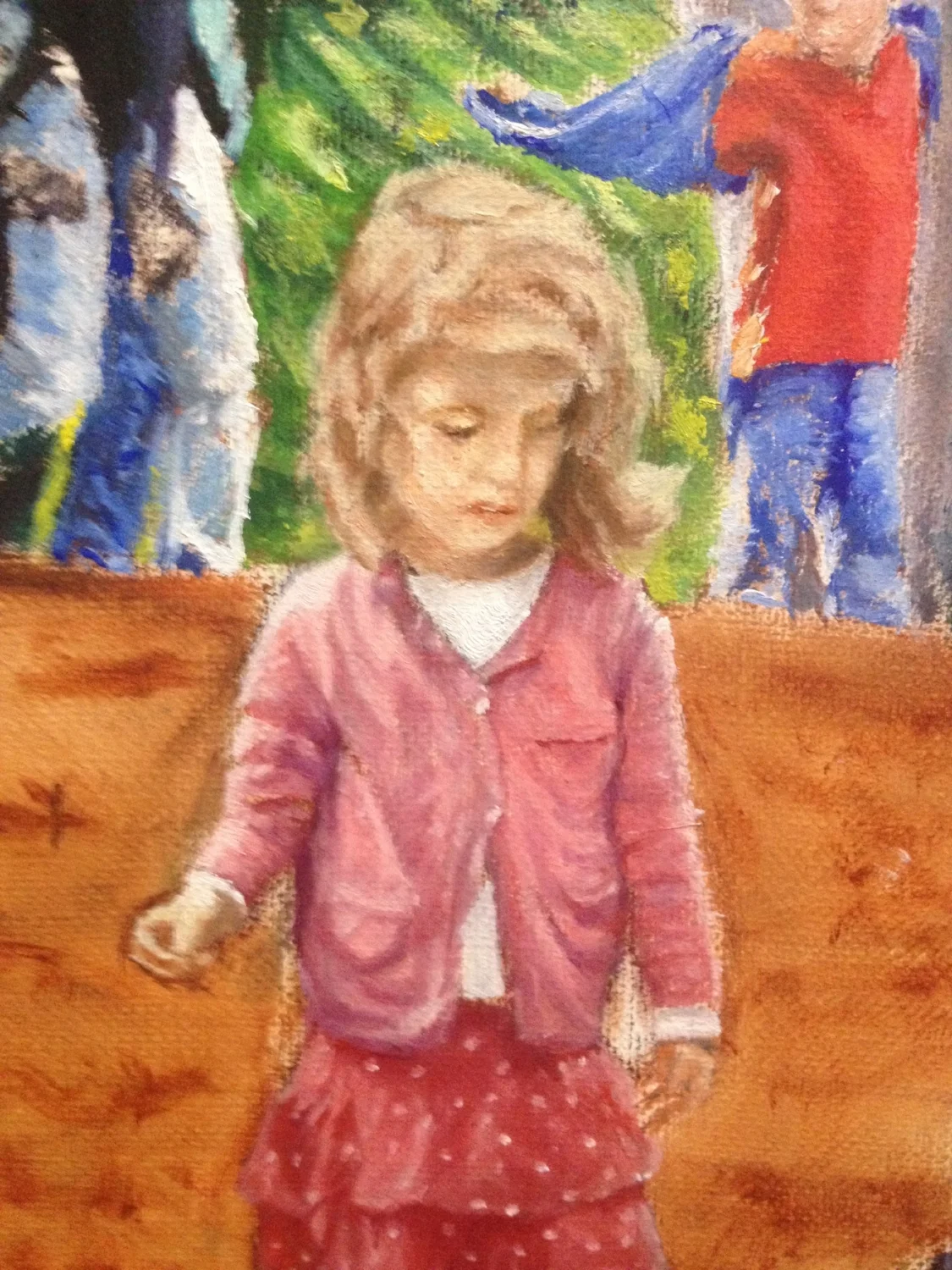 Kid watching another play with mud