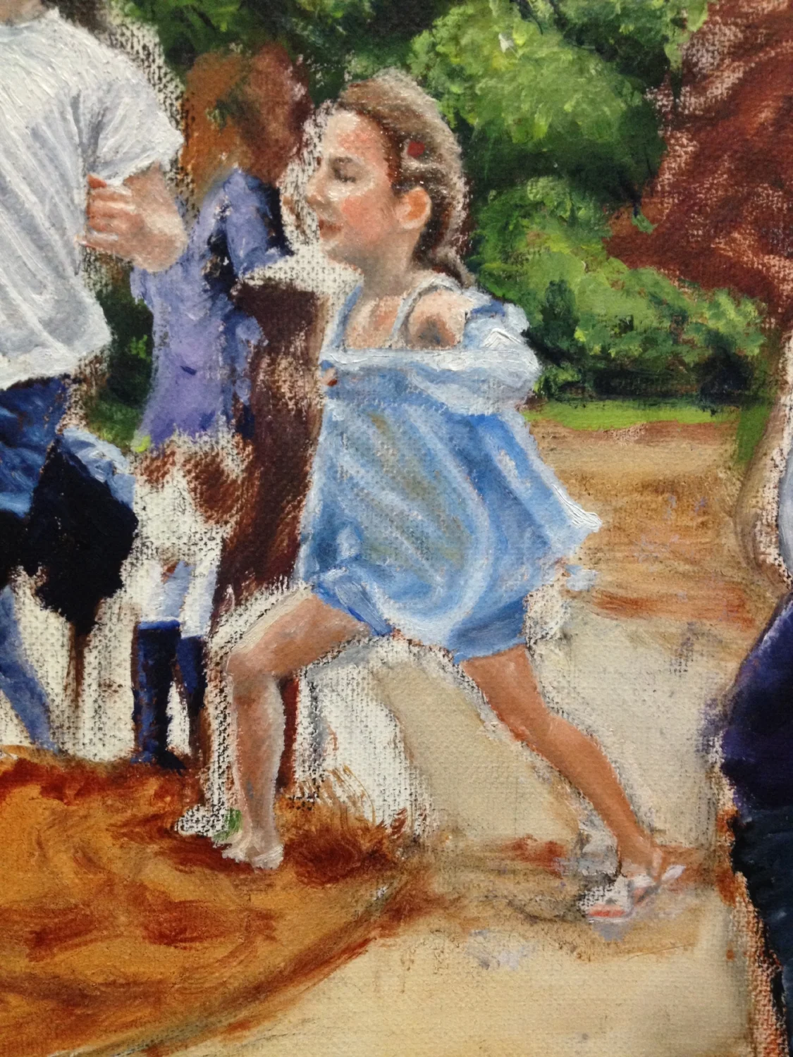 Kid running dressed in blue