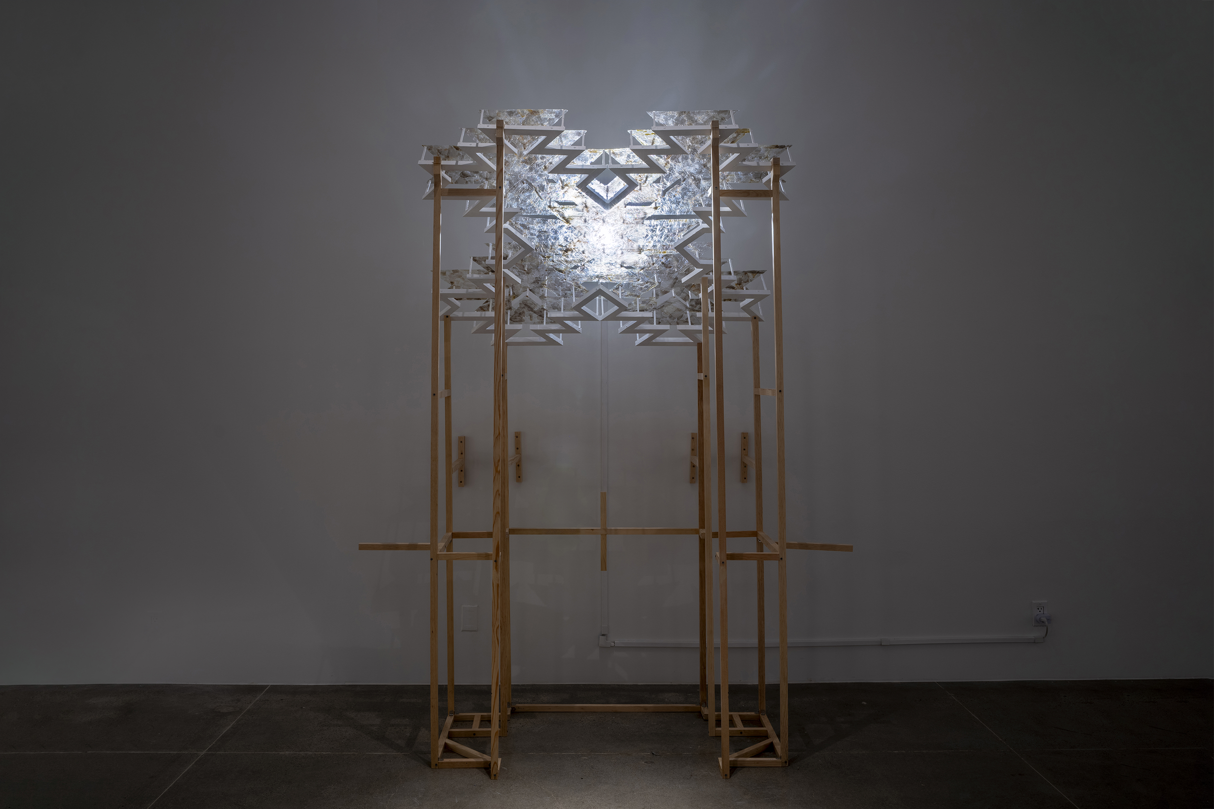   brown archaeoastronomy , 2025, light, mica, ponderosa, acrylic, 93.25x34x76in/237x86.5x193cm    commissioned by Mandeville Art Gallery, San Diego, curated by Ceci Moss, installation photography by Pablo Mason 