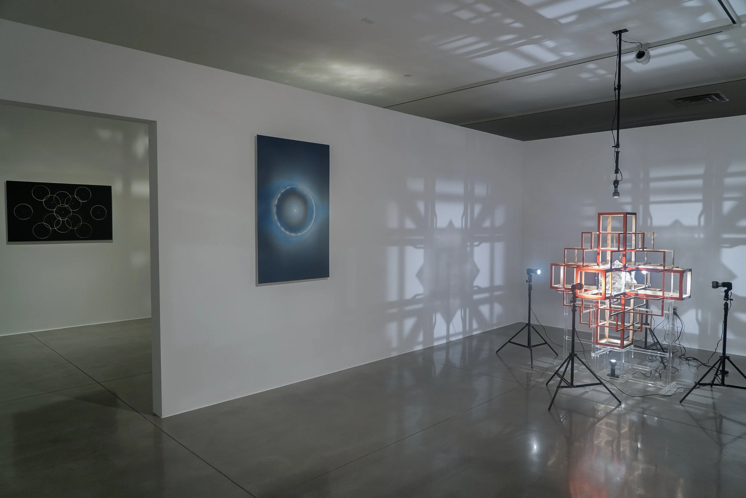  left to right:  atl (trecena de la lluvia) , 2025, photograph, 30×48in;  lejos (afelio) , 2025, photograph, 48×30in;  photosphere , 2025, light, mica, acrylic on ponderosa, 48x46x46in 