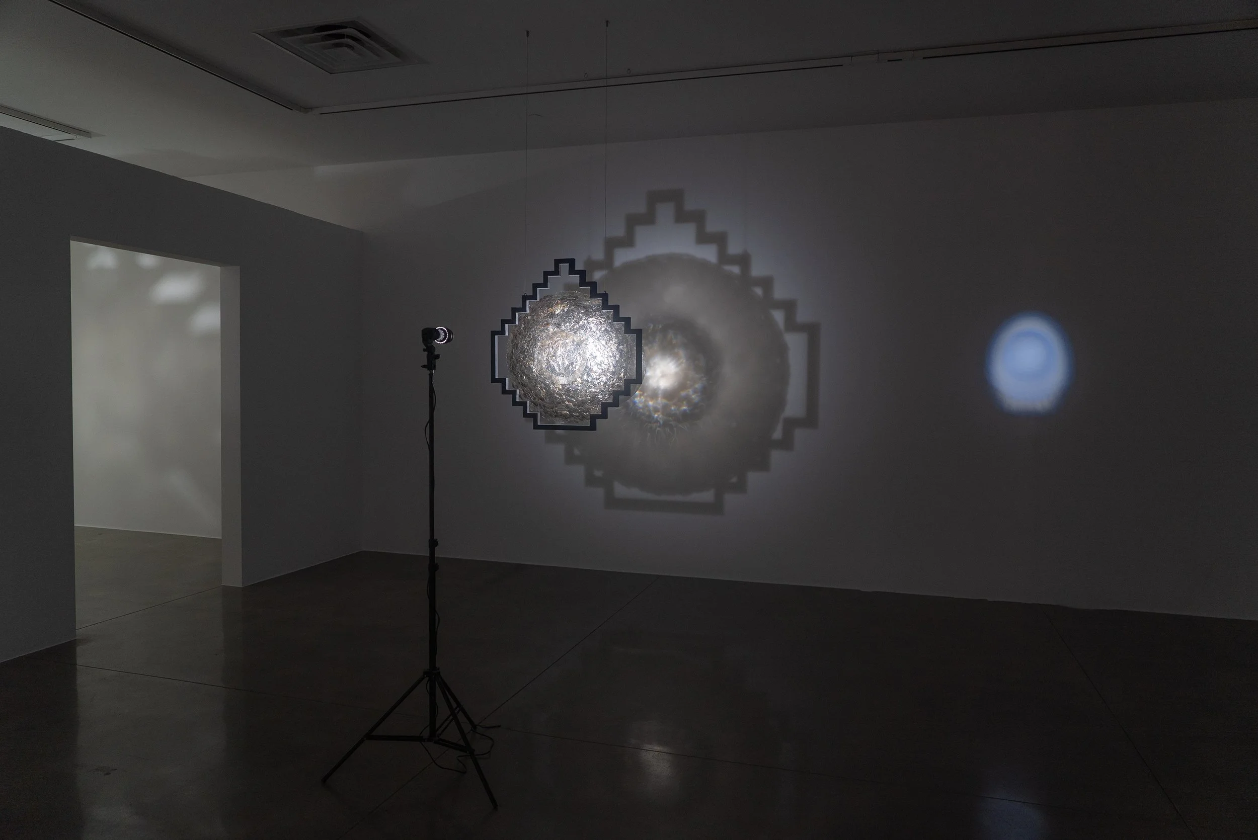   cosmovisión,  2026, light, mica, acrylic, ponderosa, 32.5x30.25x4.5in/82.5×77×11.5cm  exhibited at Museum of Art and History, Lancaster, curated by Heber Rodriguez 