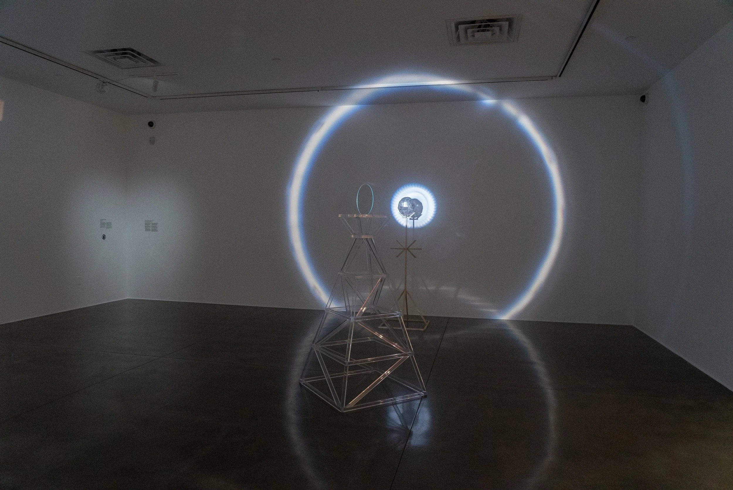   seeing environment , 2024, light, glass, acrylic, mica, wood, 65x30x30in (beam splitter), 64.5x26x26in (mica sphere) 