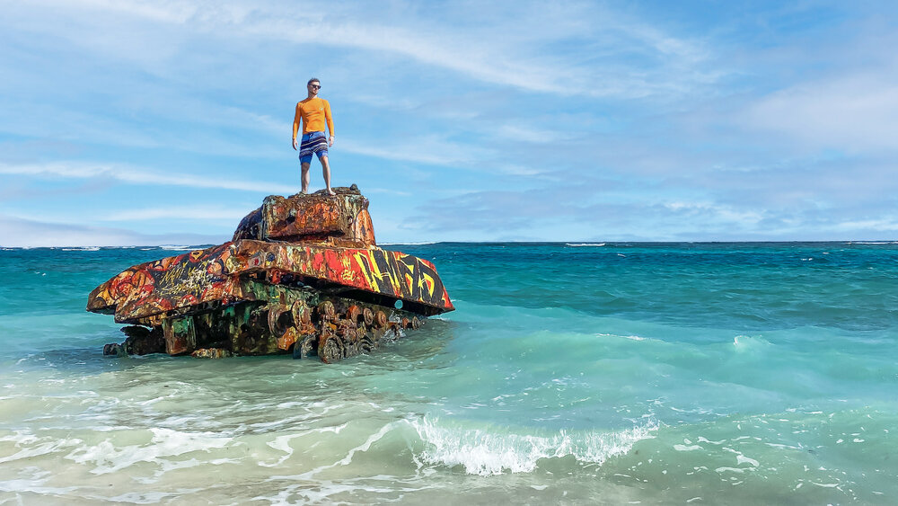 Jim standing on the famous military tank at Flamenco Beach in Culebra, Puerto Rico.