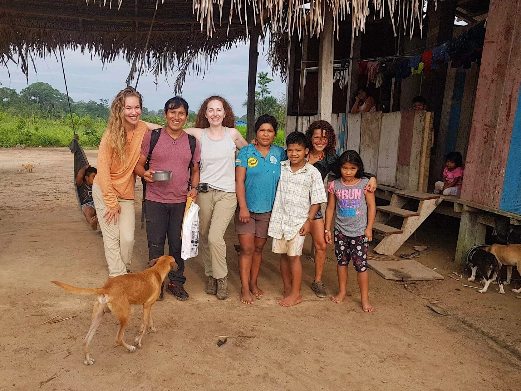 Pictured: Samantha Zwicker and Ronee Collins with members of the Lucerna community