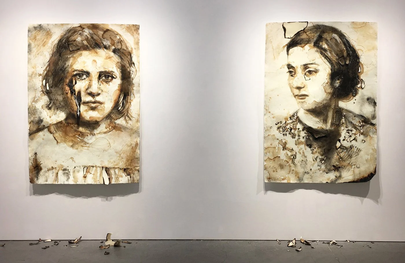 Giuditta and Donatella 2018<br>Site-specific installation at Nancy Toomey Fine Art, San Francisco.  Mixed media with coffee, charcoal and burned paper. Dimensions variable