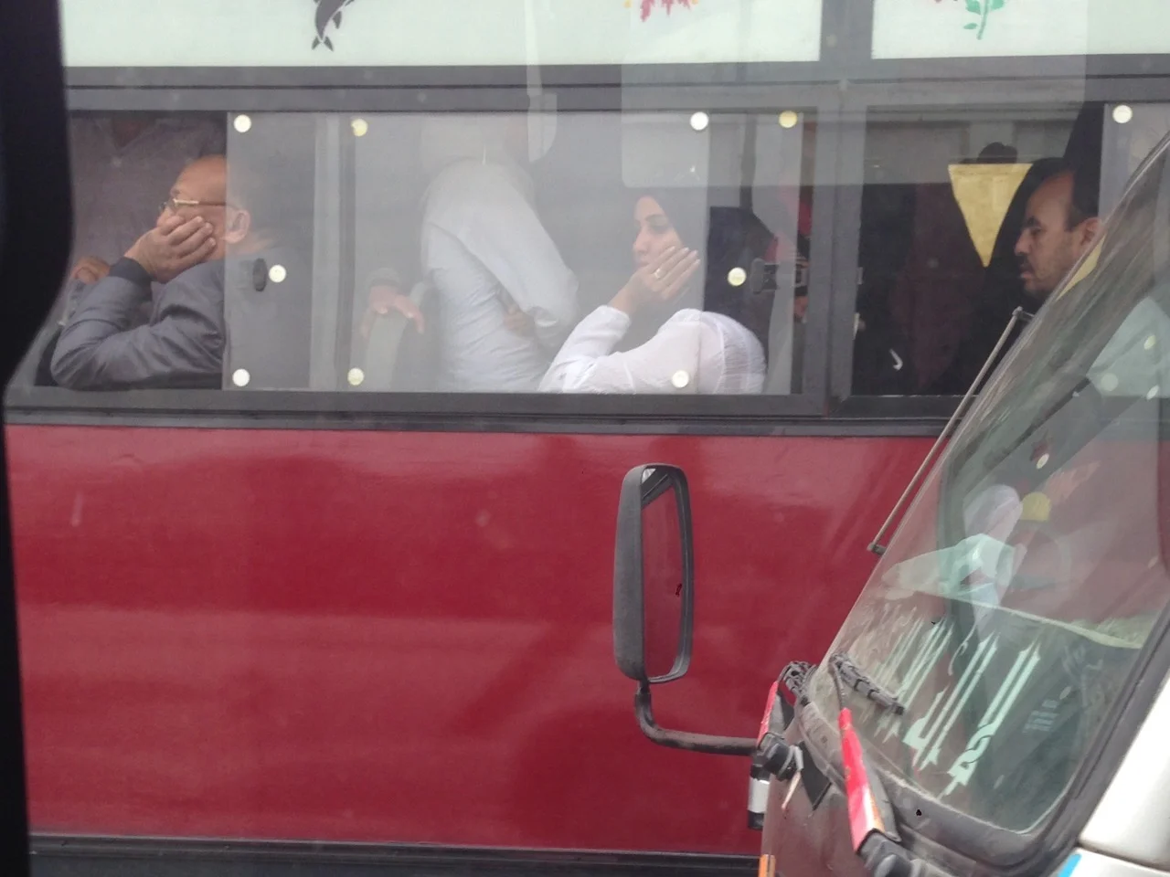 Woman inside a bus. Cairo. Egypt. 2016. © Michele Cortina.