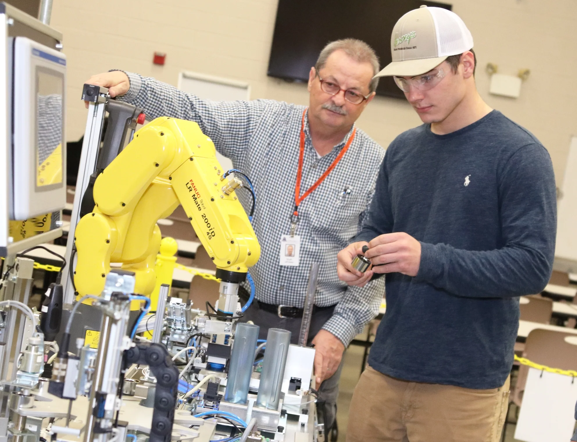 yellow machine and teacher.jpg
