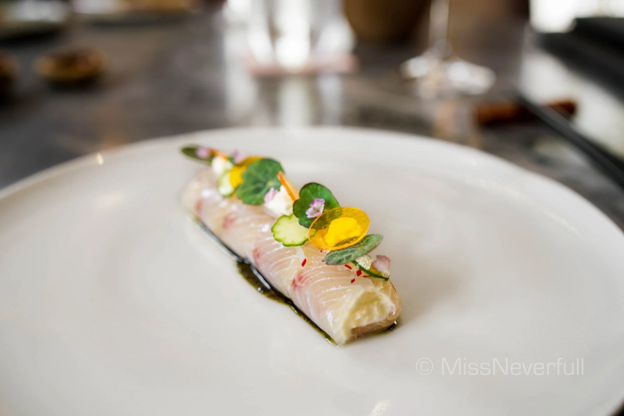 Sashimi of yellowtail Amberjack, lime crème fraîche, dashi jelly, white soy dressing