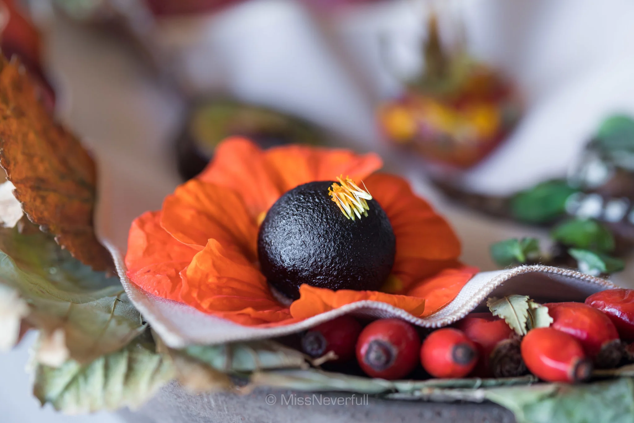 Nasturtium stuffed with black currant berry