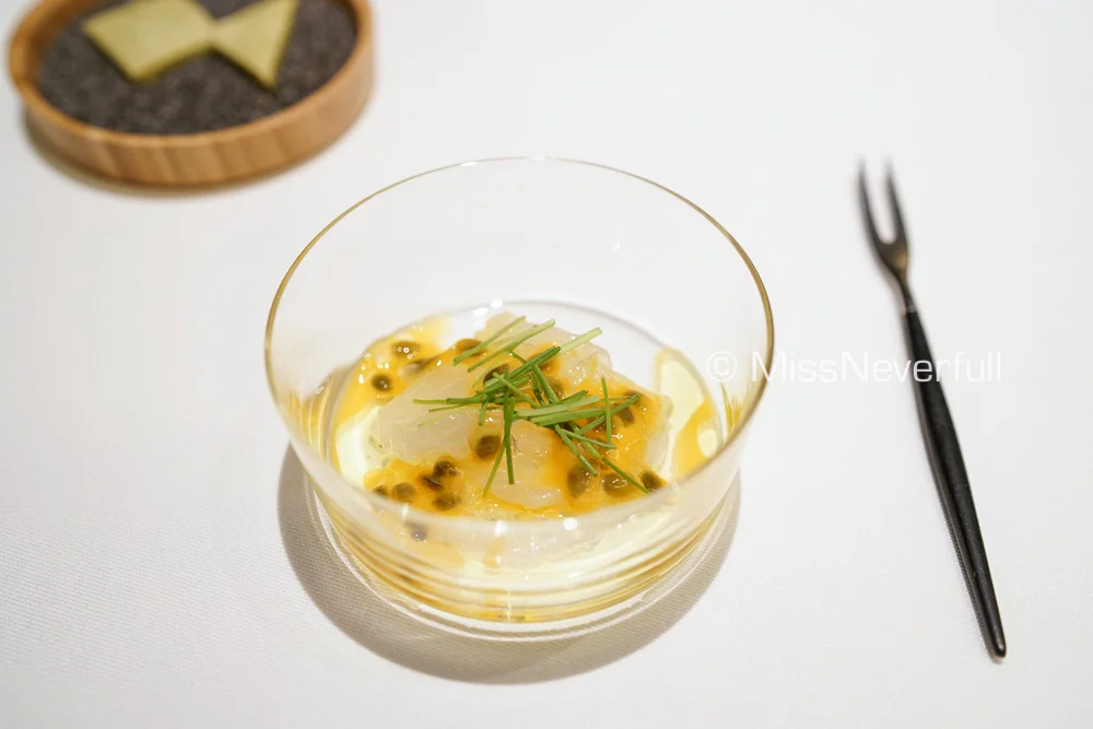 Amuse Bouche: Hirame, passionfruit, young scallion