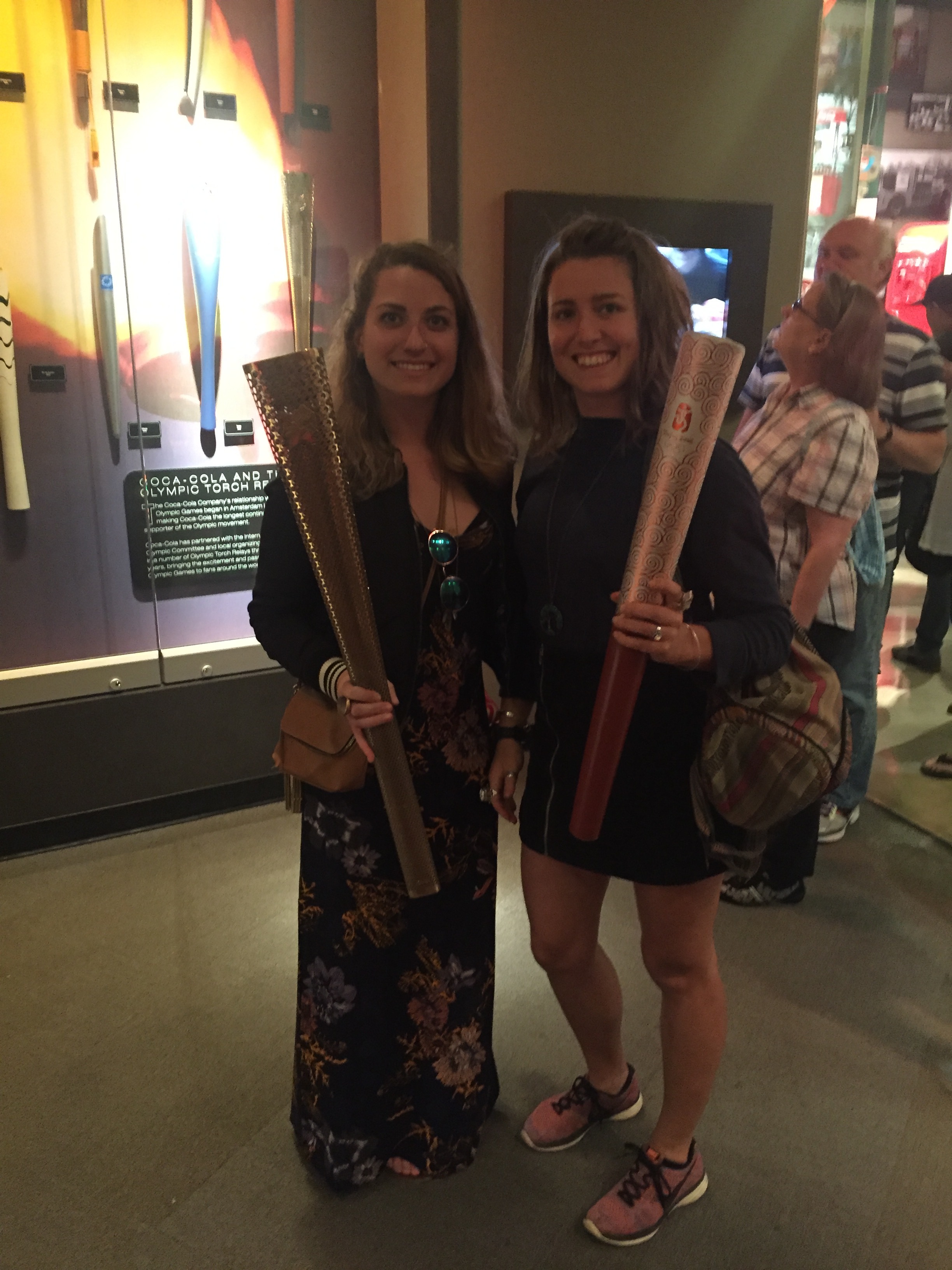 We're holding OLYMPIC TORCHES!